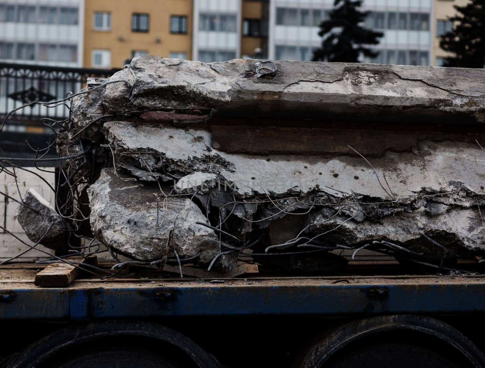 fragments of old worn-out concrete with reinforcement