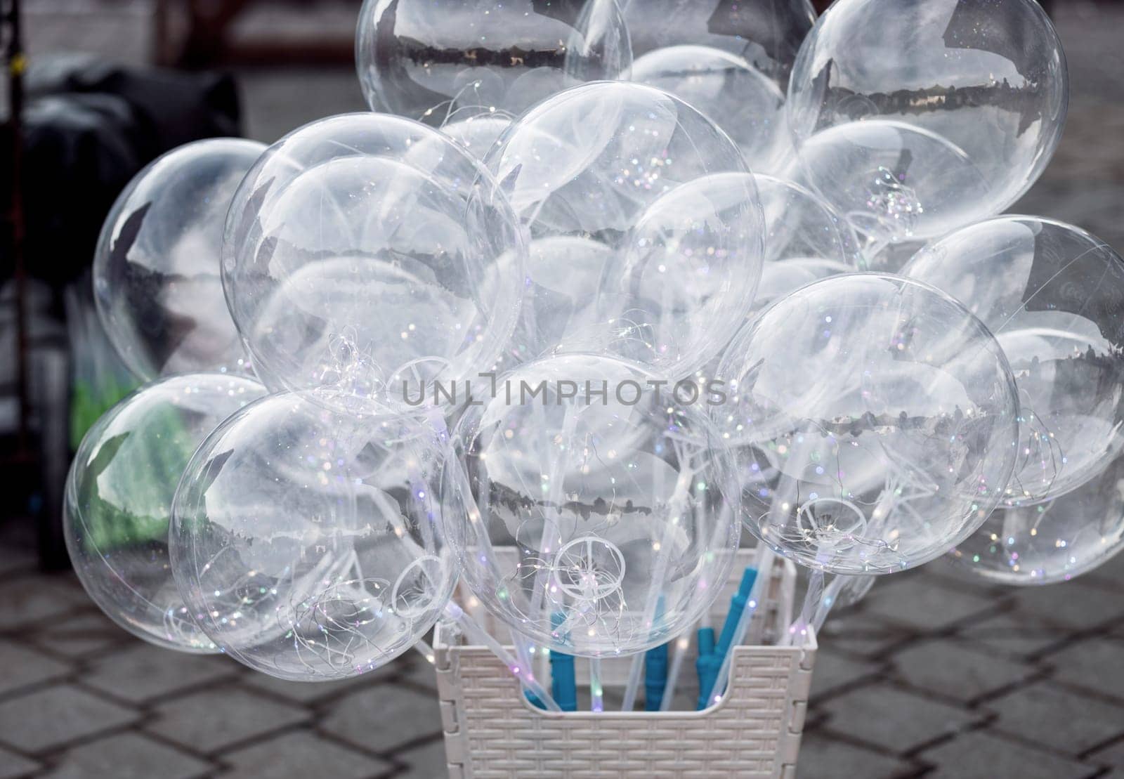 lots of festive inflatable transparent balloons. gift