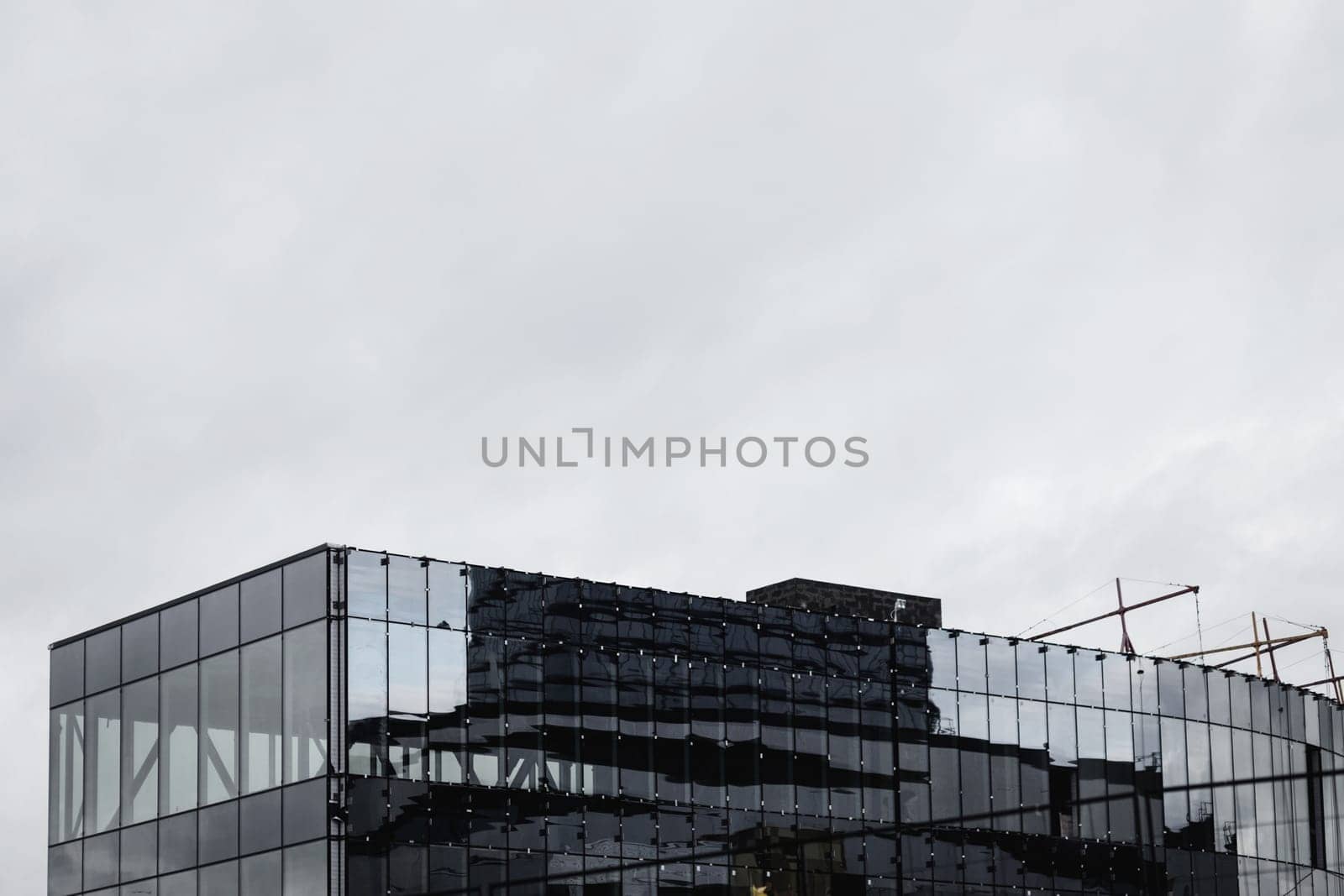 Abstract fragment of modern architecture, walls made of glass