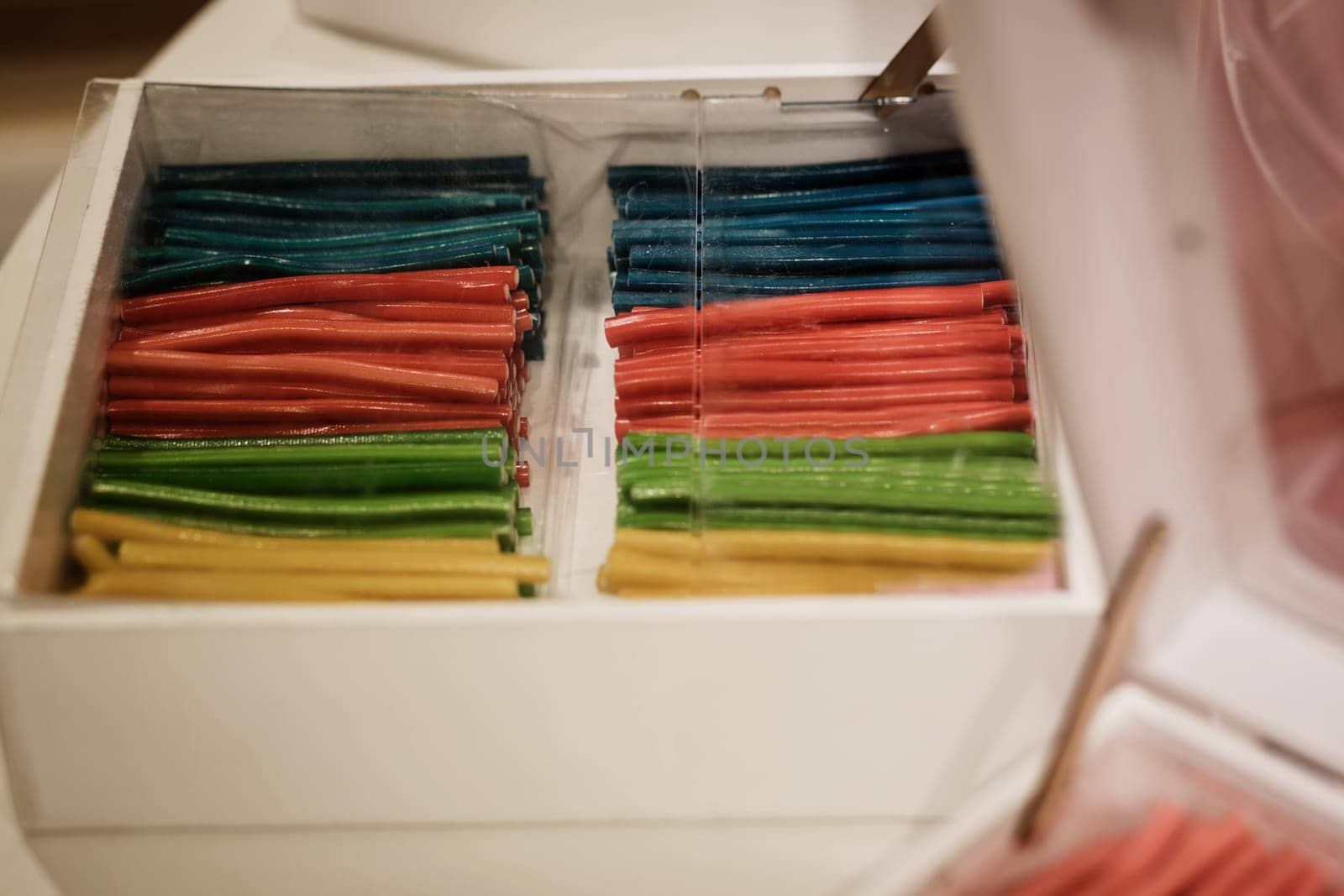 colorful licorice yummy candies in box. delicious junk food