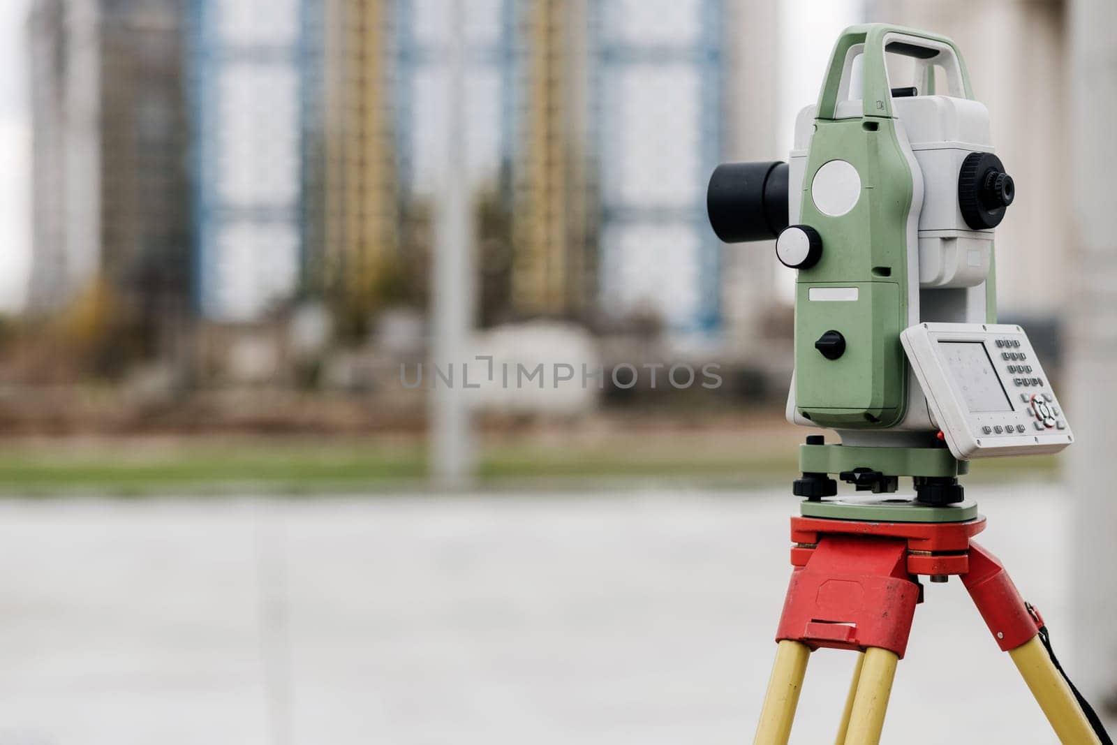 Optical level. A tool for carrying out geodetic work and measuring the difference in height between points on a plane. Copy space