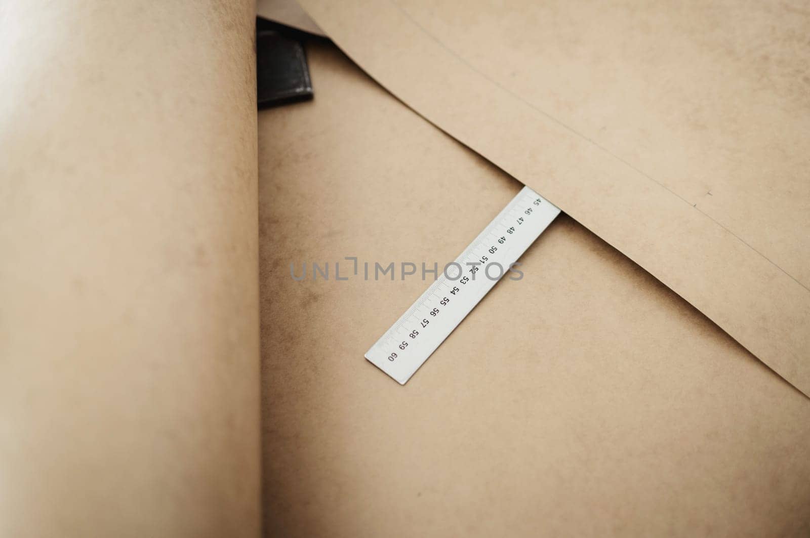 Tailor designer workplace concept. measure and paper with drawings
