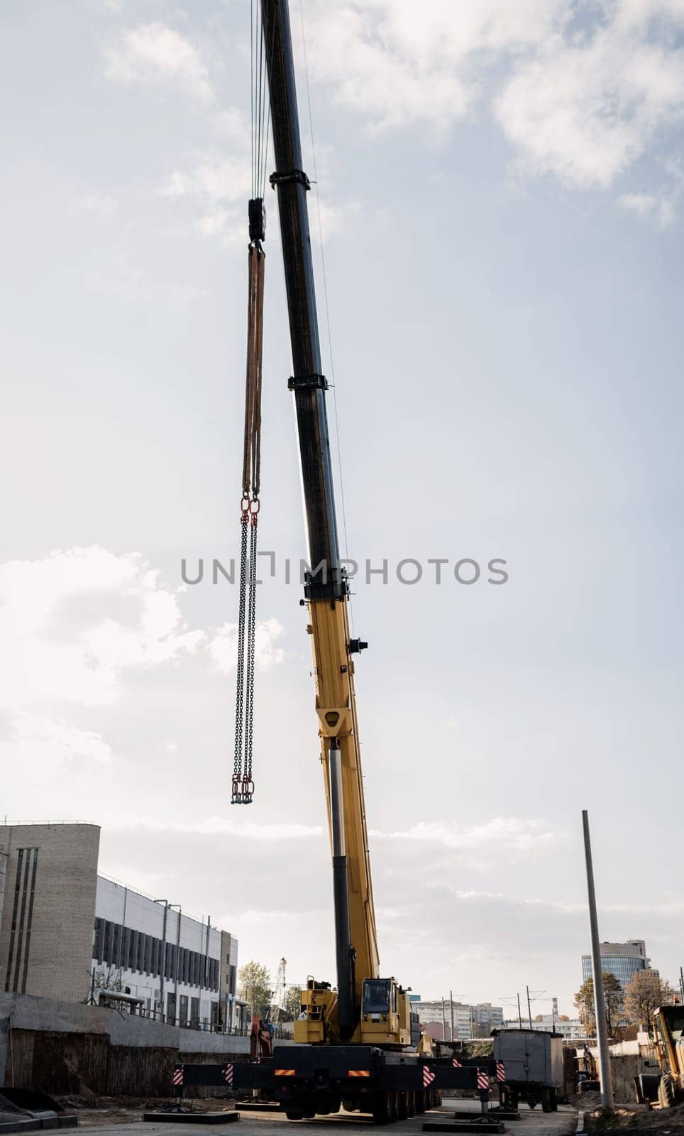 yellow wheeled truck crane by Ladouski