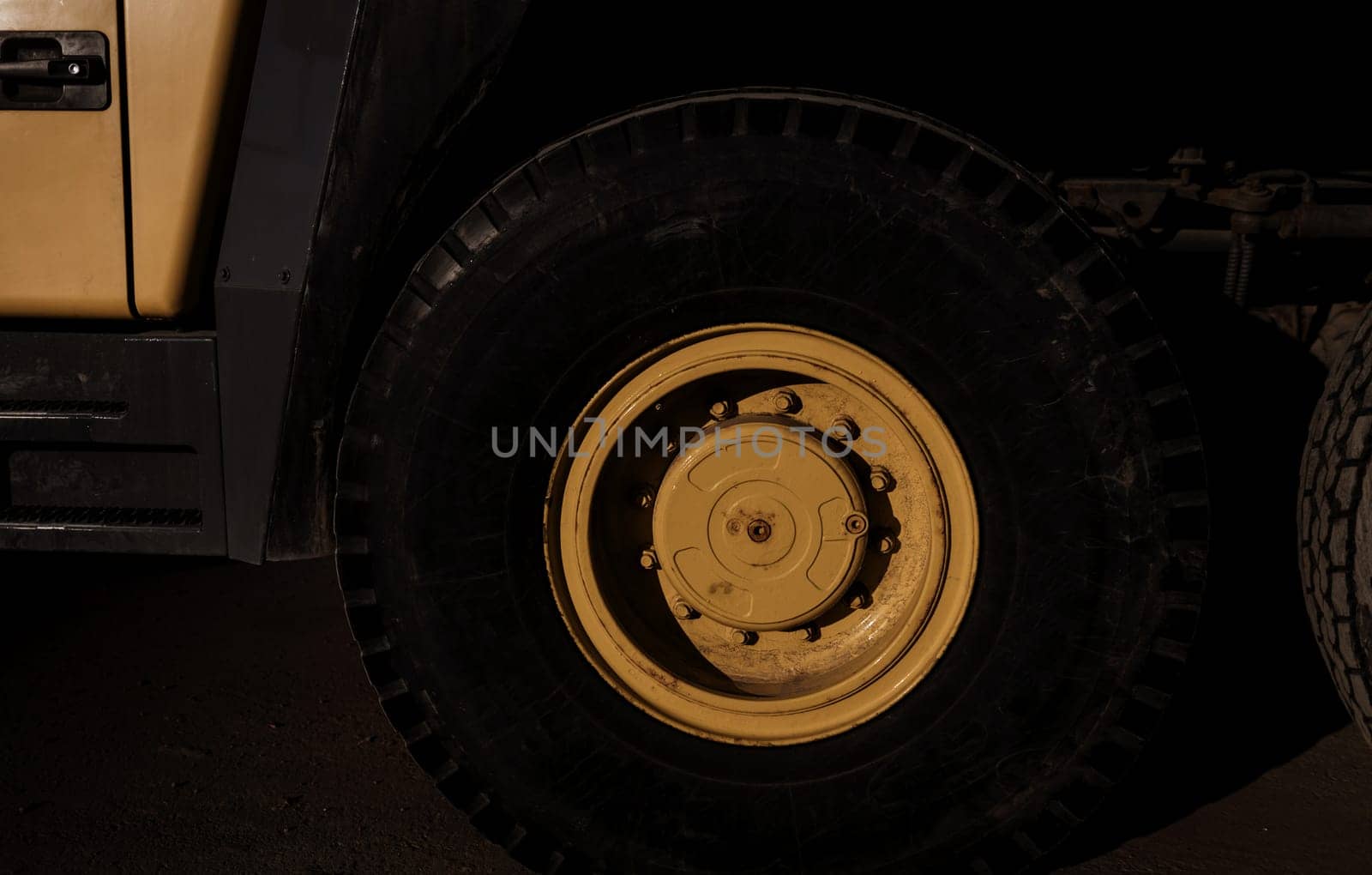 Wheel yellow truck crane. element of construction equipment