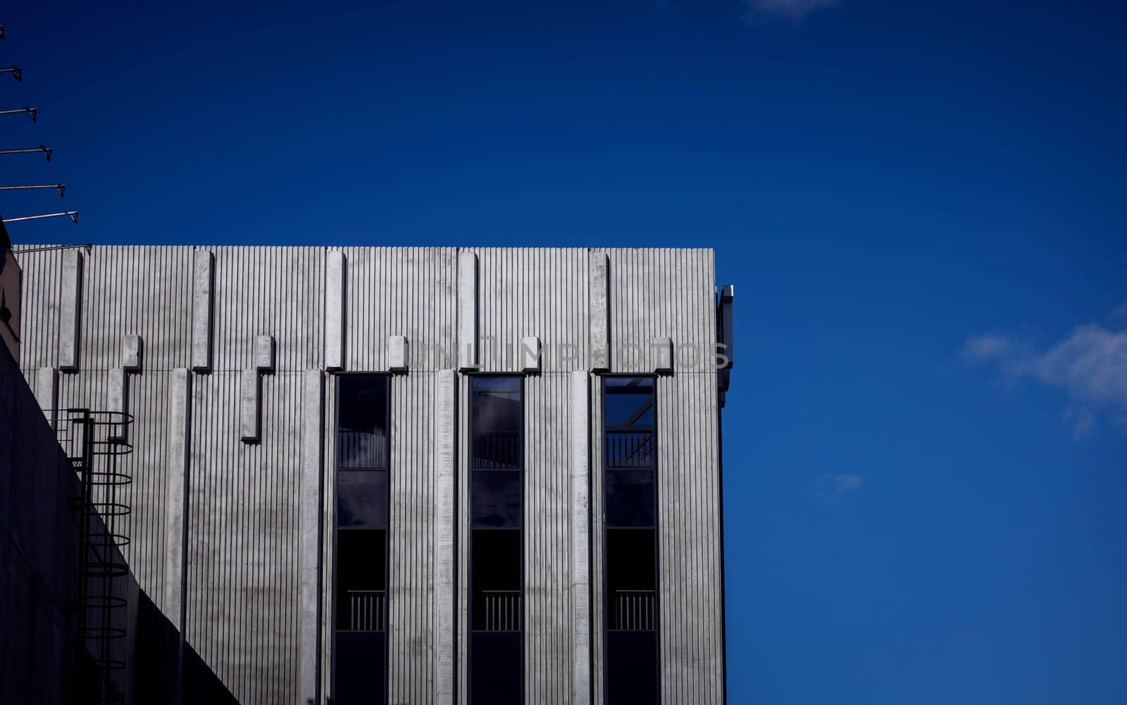 minimalistic architecture. concrete building over sky background