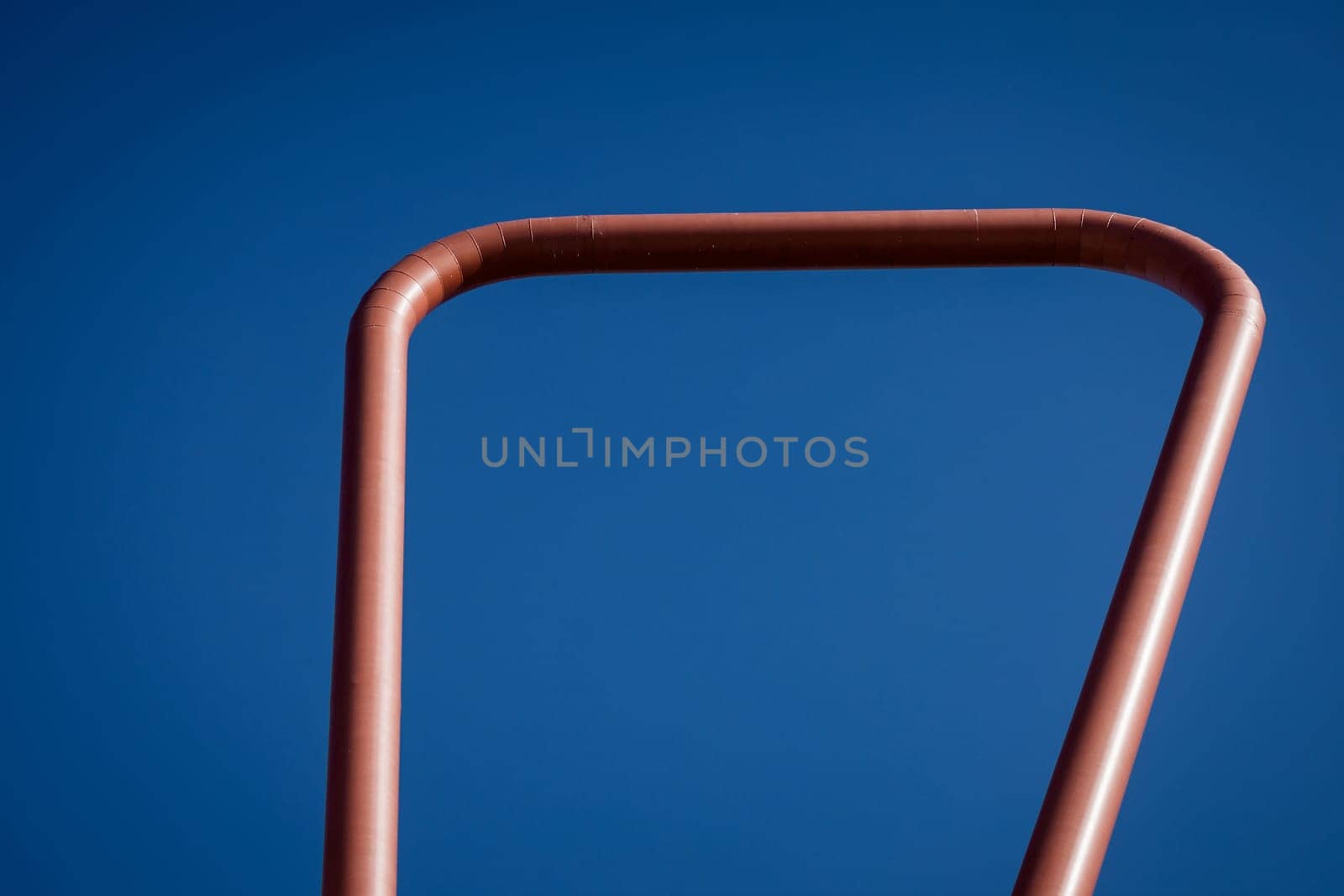 Abstract architectural features. structure of a metal construction with blue sky