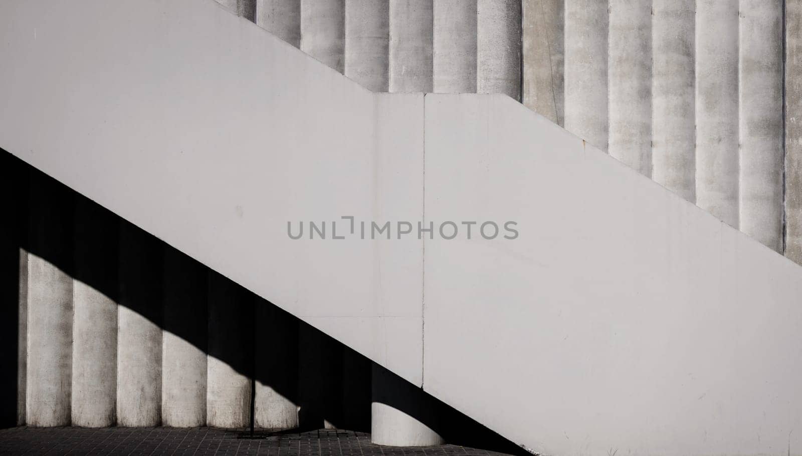 Geometric architecture details modern building exterior with concrete. Abstract staircase