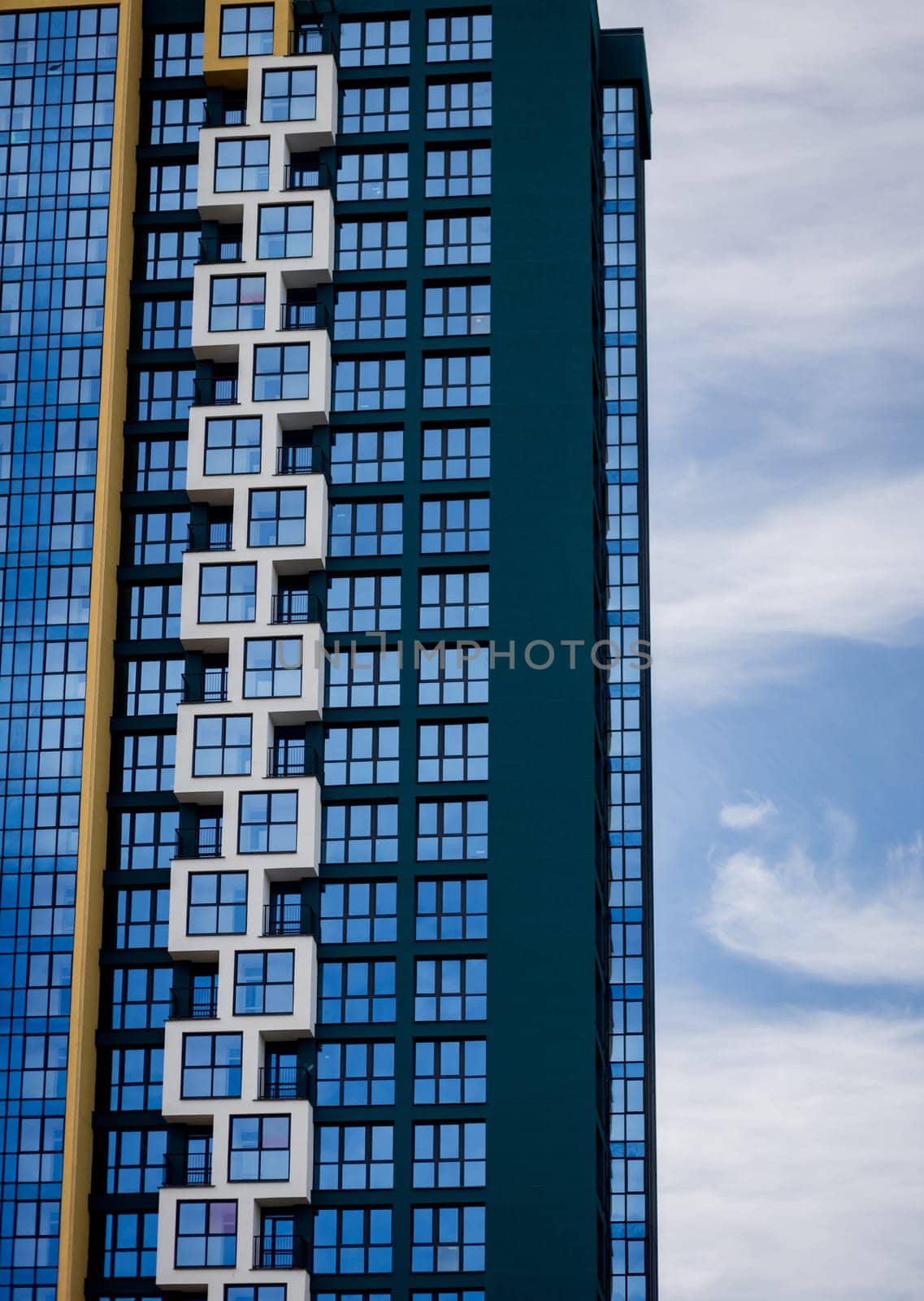 Colourful residential building against blue sky