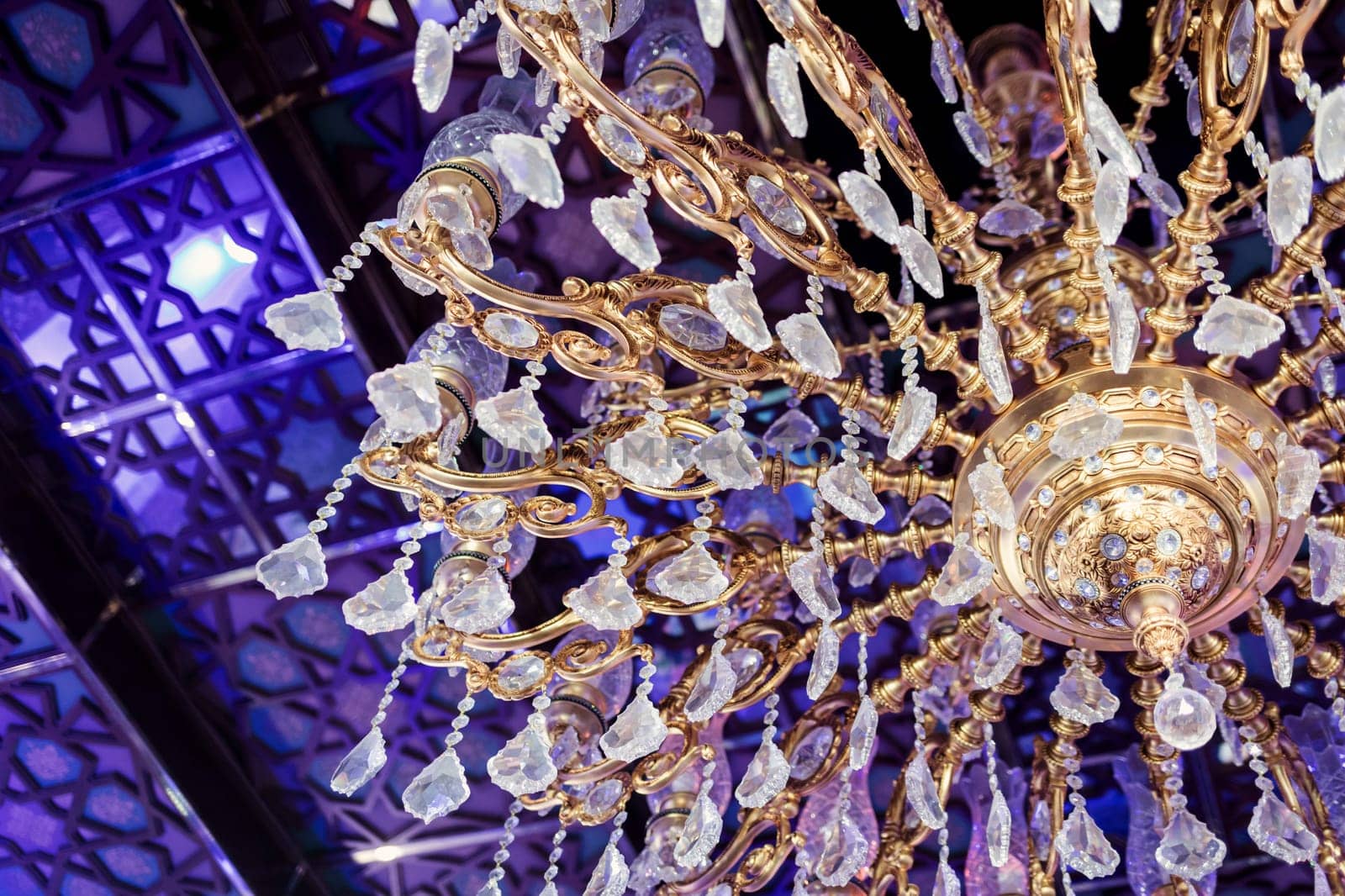 antique beautiful crystal chandelier in room
