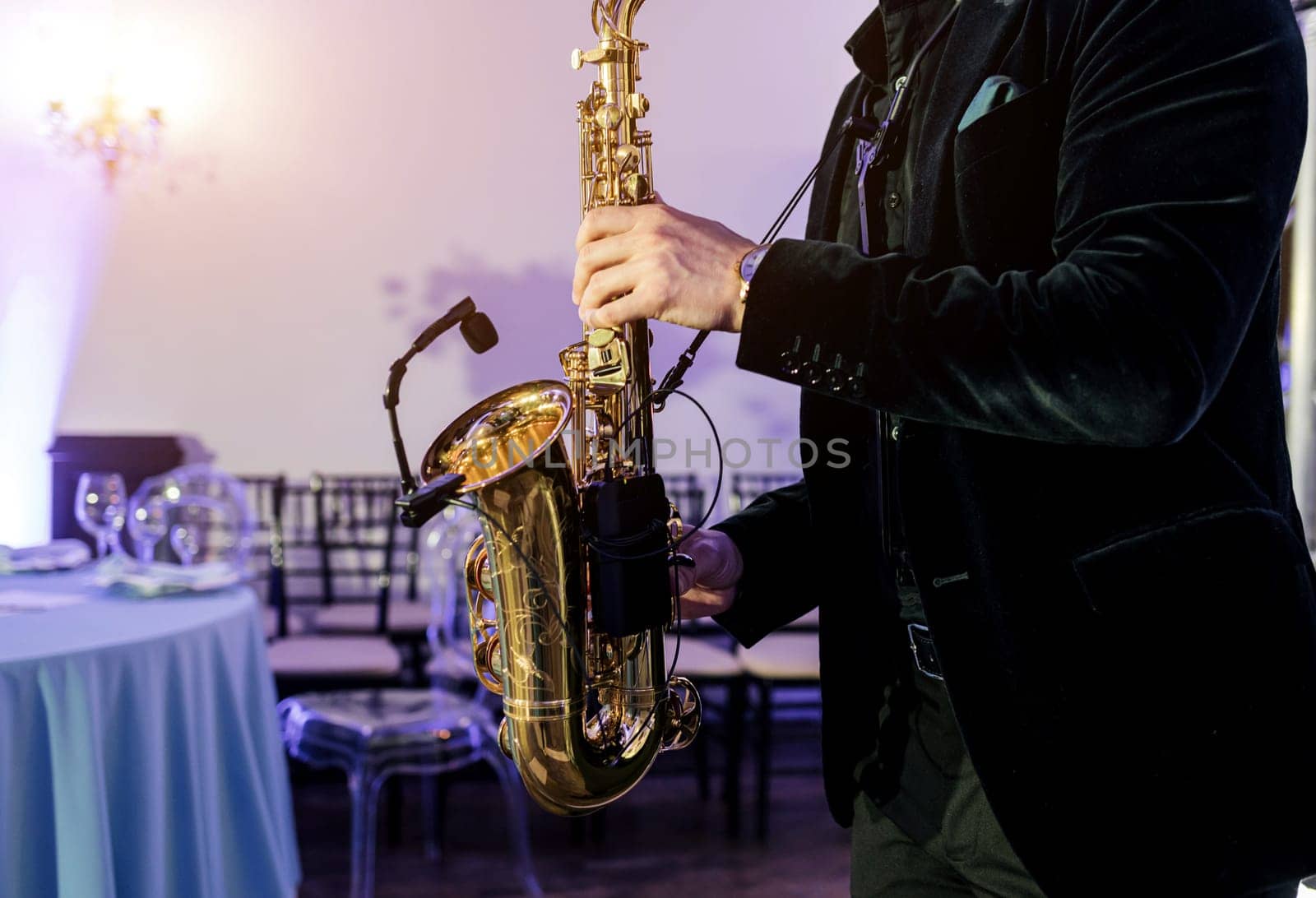  Saxophone, music instrument played by saxophonist player musician in fest.