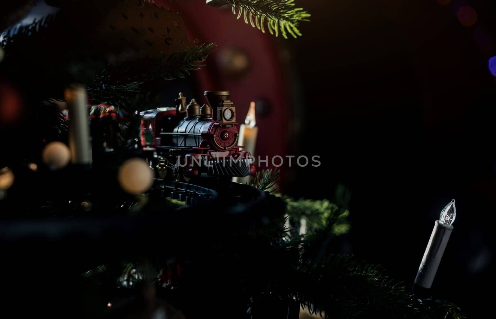 retro christmas train on tree. miniature railway