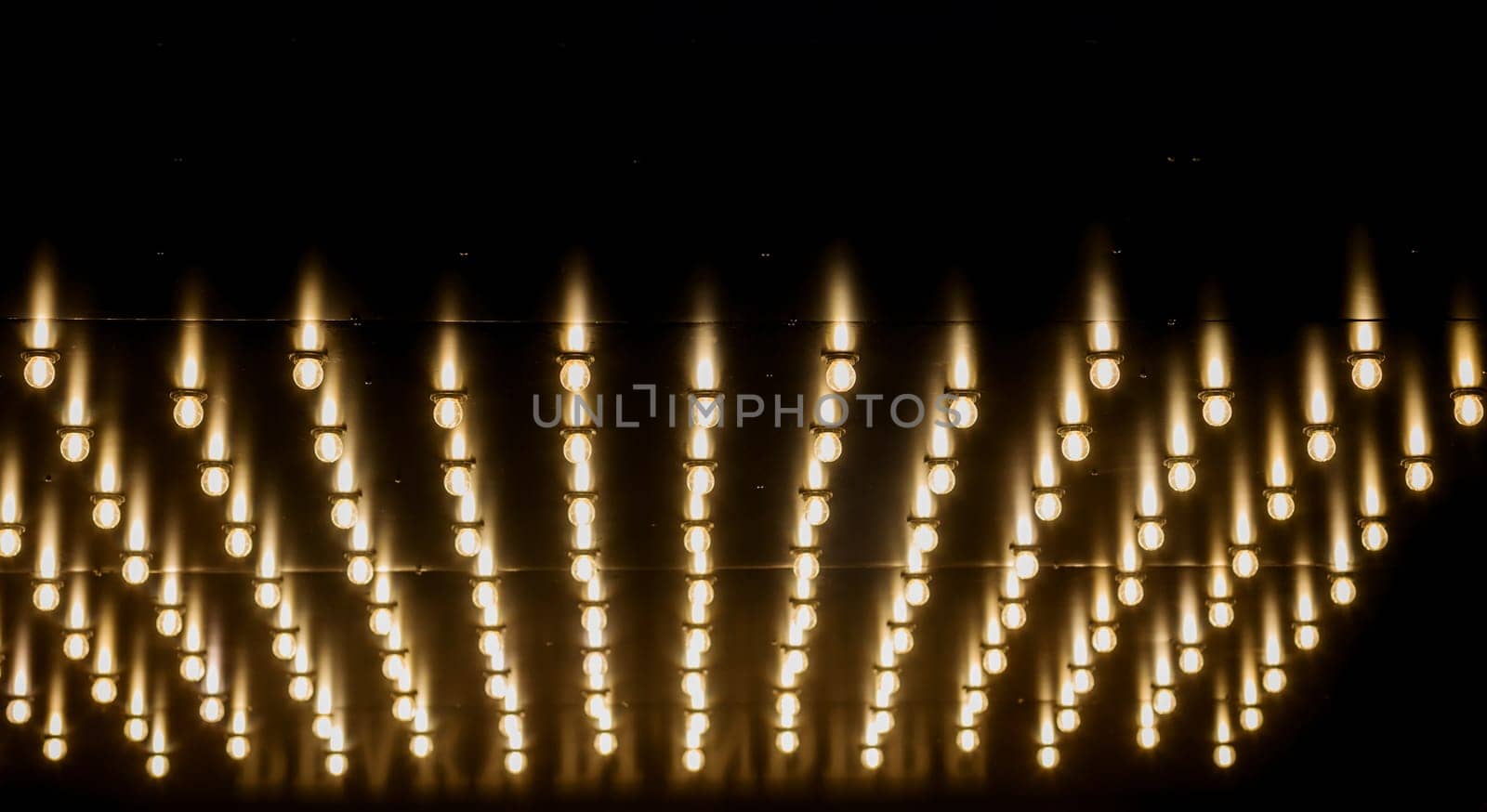 group glowing lamps. many light bulb