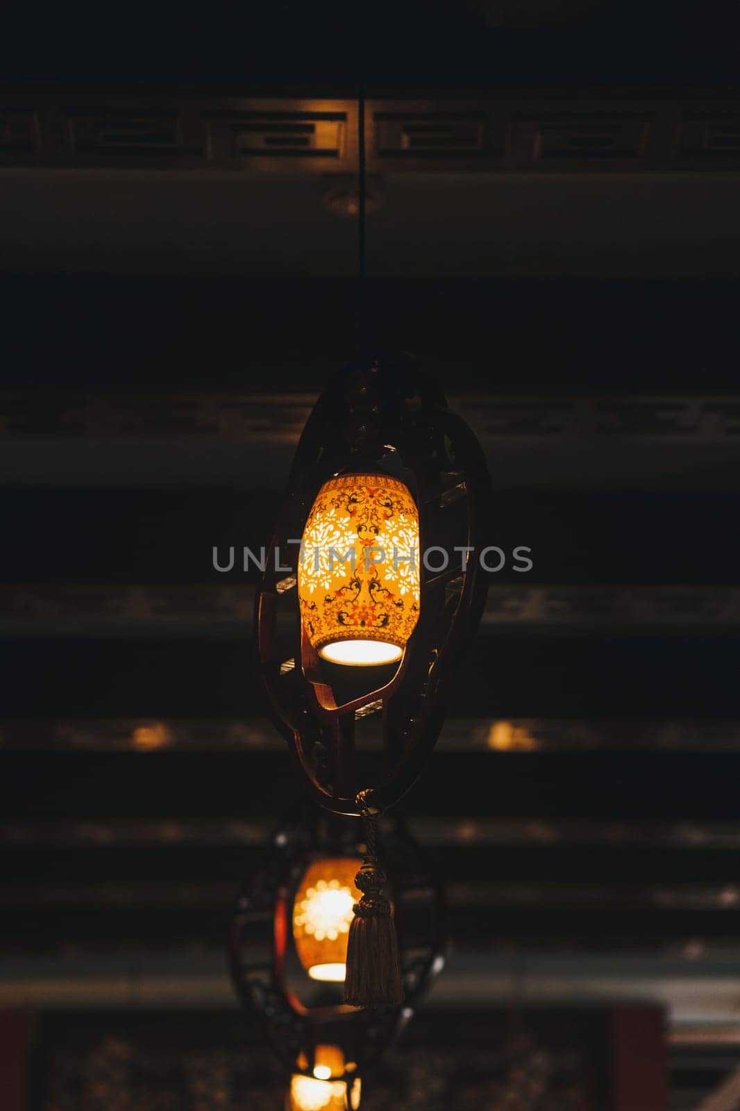 modern hanging lights in the dark interior of a cafe or restaurant