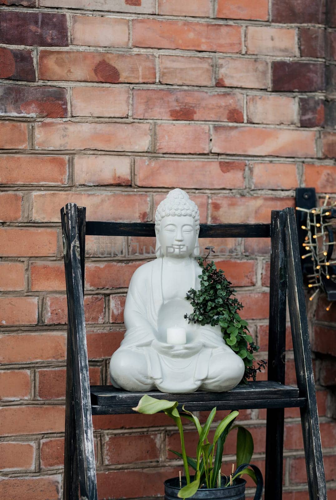 Buddha statue in meditation position, exterior design. 