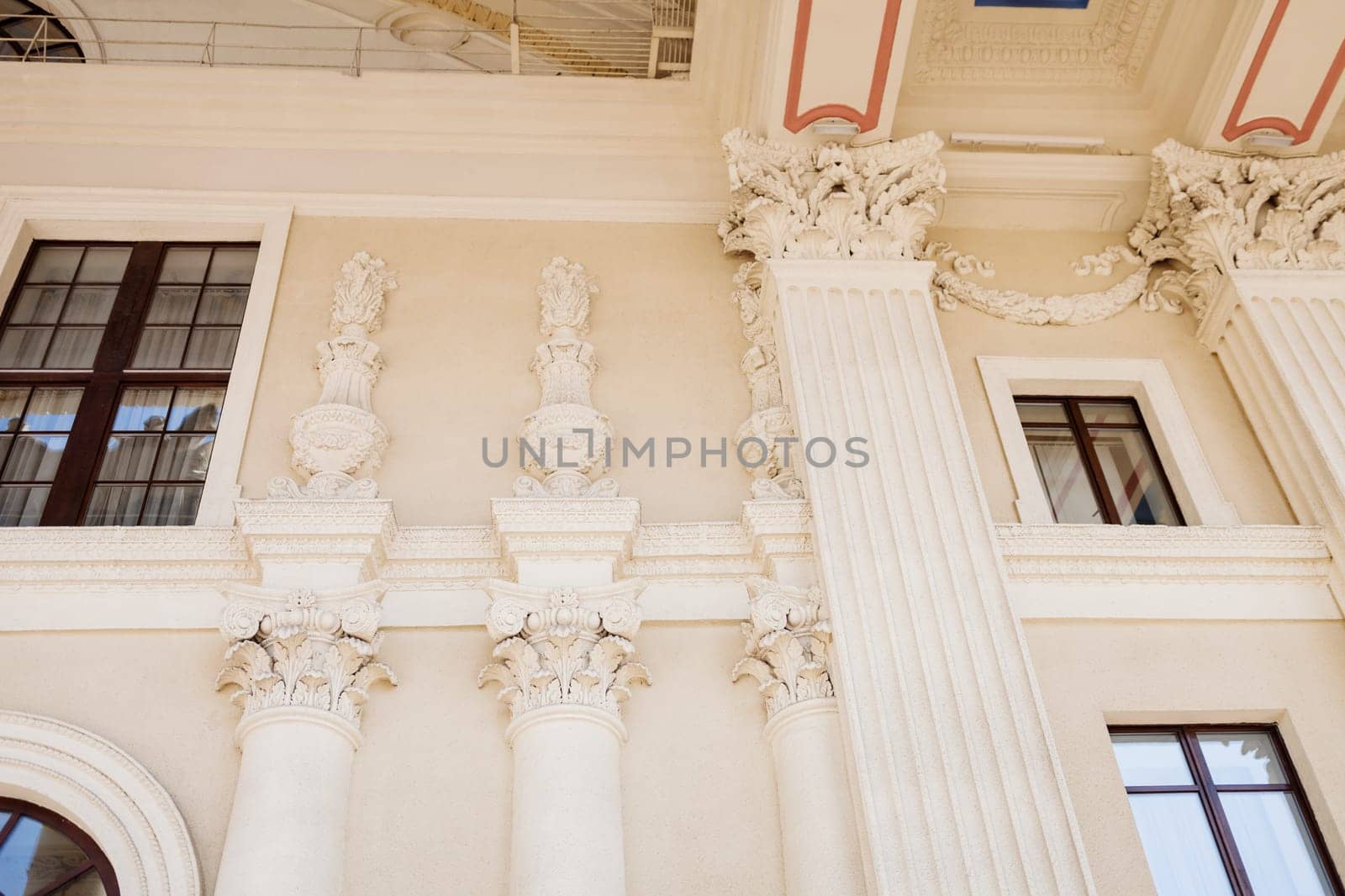 old European architecture with stucco and carved columns