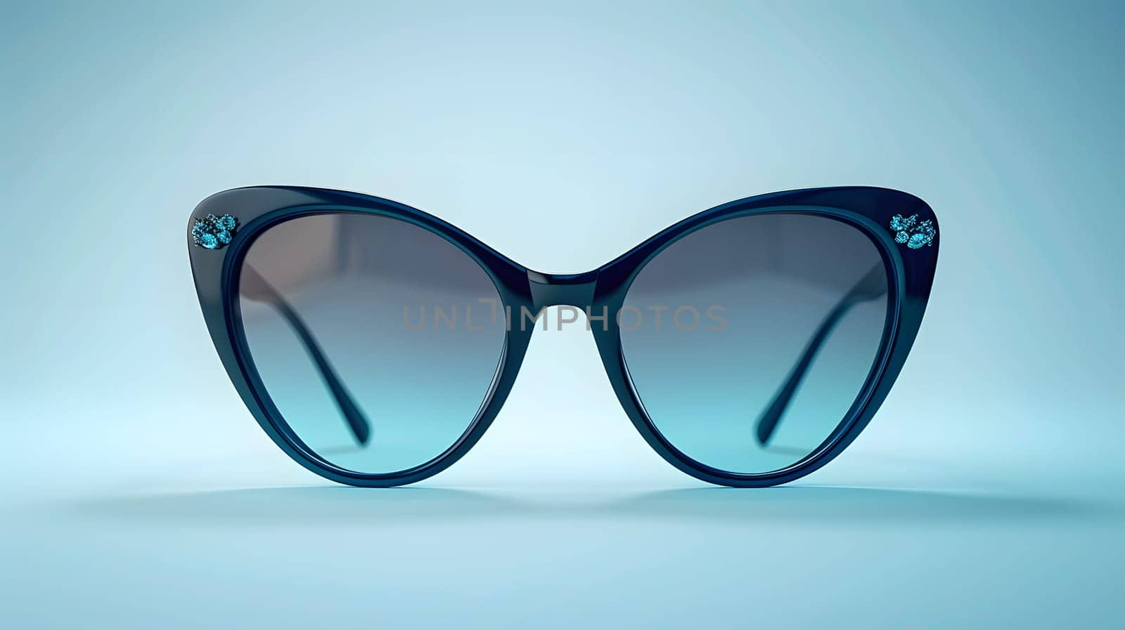 Cat eye sunglasses resting on a vibrant azure surface. These stylish glasses are a trendy eye glass accessory, perfect for adding a pop of color to your eyewear collection