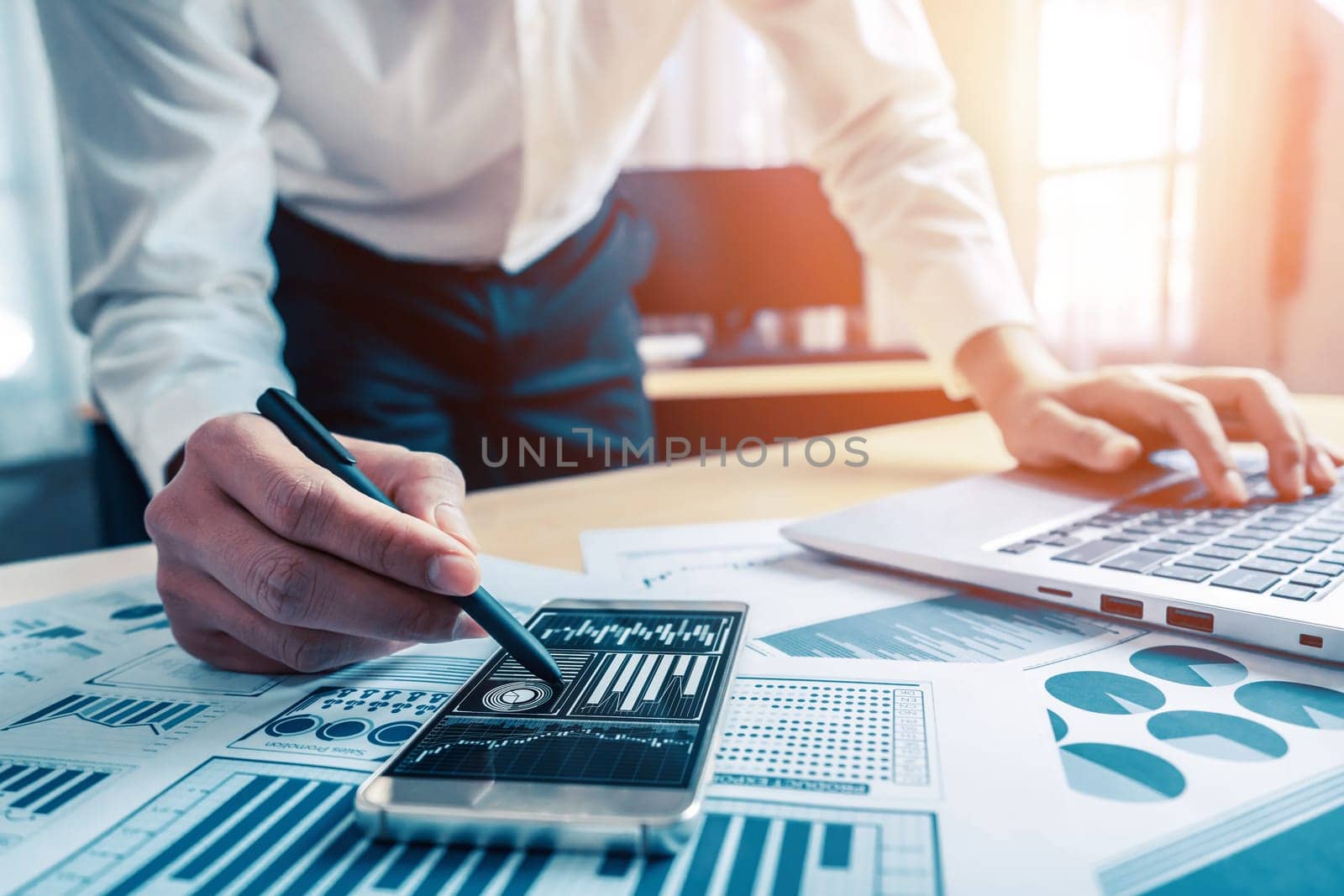 Businessman accountant or financial expert analyze business report graph and finance chart at corporate office. Concept of finance economy, banking business and stock market research. uds