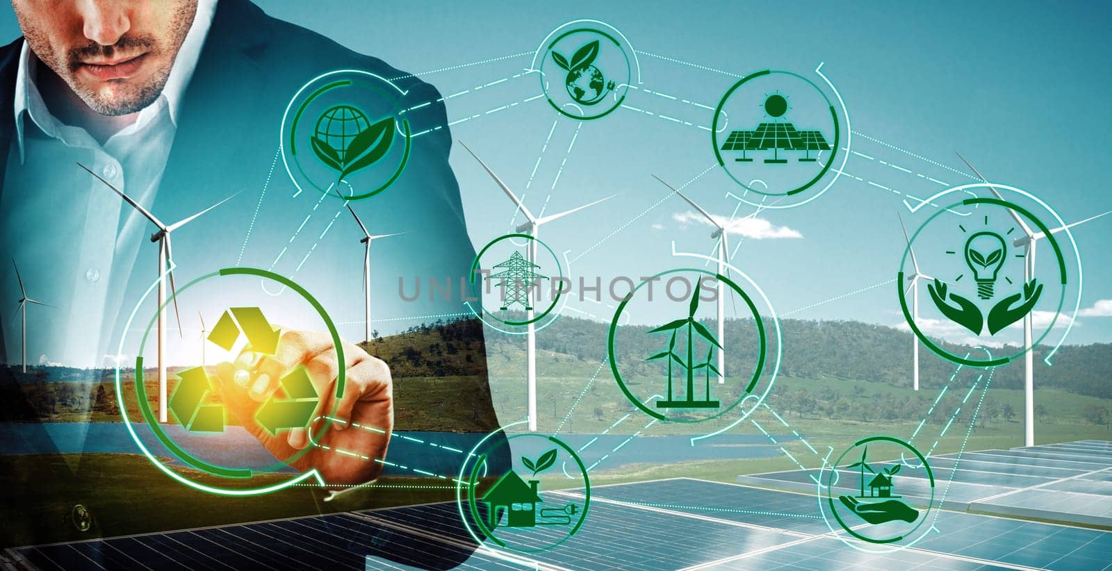 Double exposure graphic of business people working over wind turbine farm and green renewable energy worker interface. Concept of sustainability development by alternative energy. uds