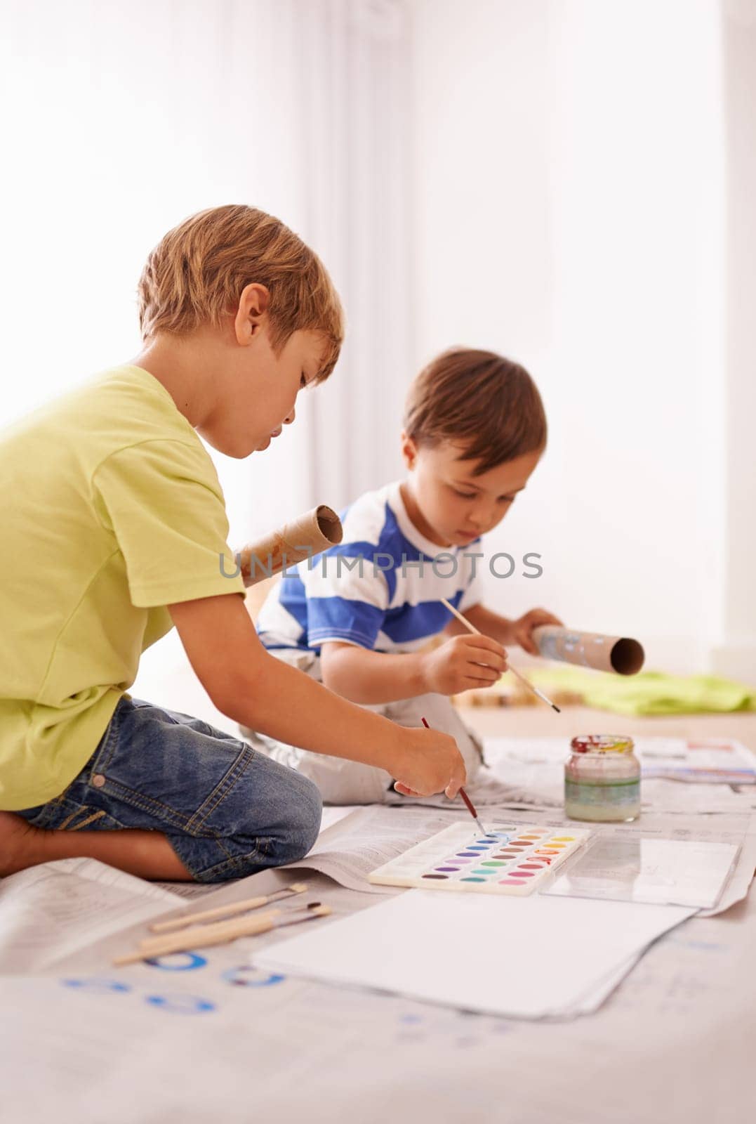 Creative, children and painting in home for development, colorful activity and fun education together. Kids, drawing and learning with paper for bonding, future artist or homework with art project.