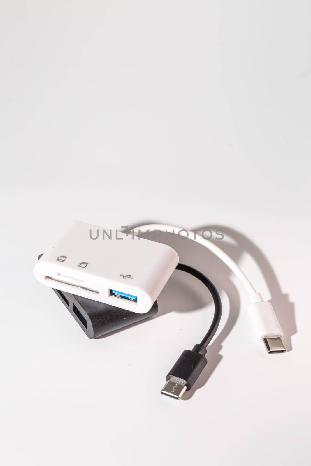 USB-C to USB 3.0 and SDMicroSD Card Reader Adapter. Connect devices to computer. Easily connect USB devices, SD cards, and microSD cards to laptop, tablet, or smartphone. Small and lightweight.