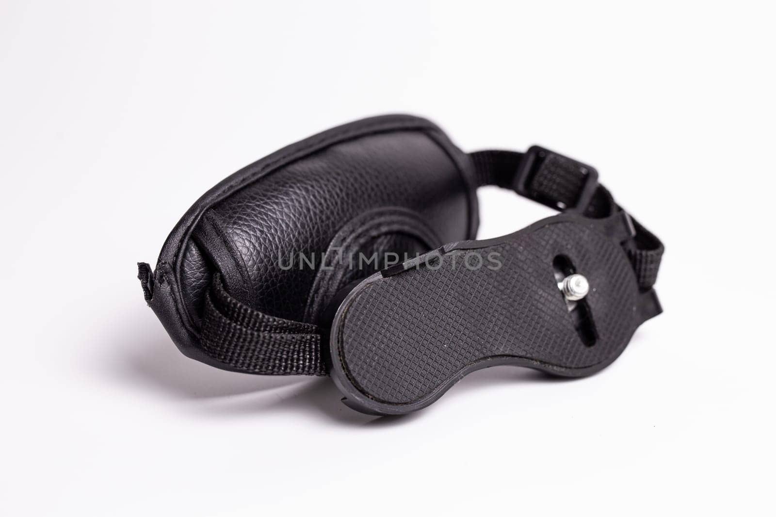 Black camera hand strap made of genuine leather with a metal carabiner for attaching to the camera by Pukhovskiy