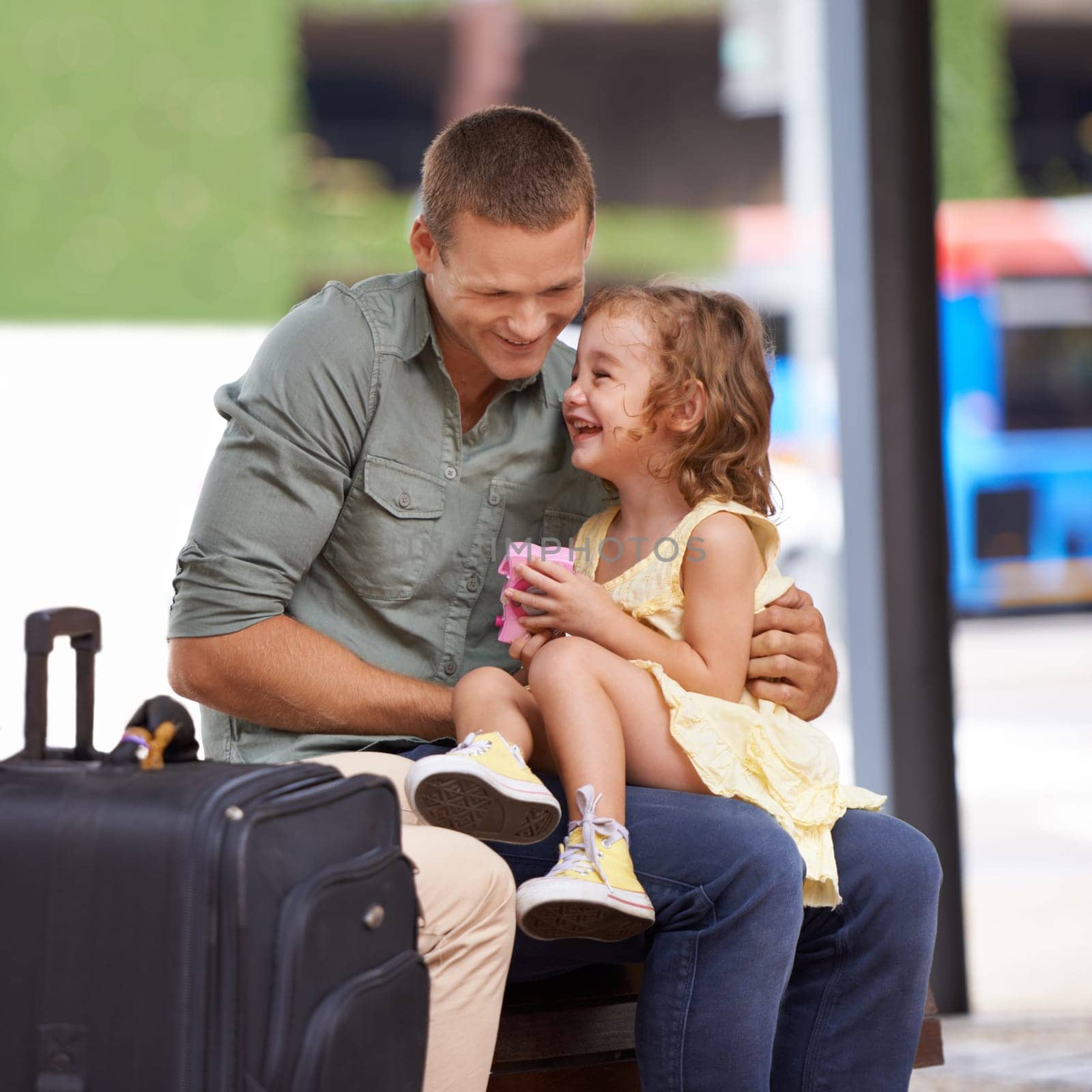 Father, child and suitcase for travel outdoor or happy laughing together for holiday, vacation or journey. Male person, daughter and luggage or waiting for trip to Hawaii, travellers or connection.
