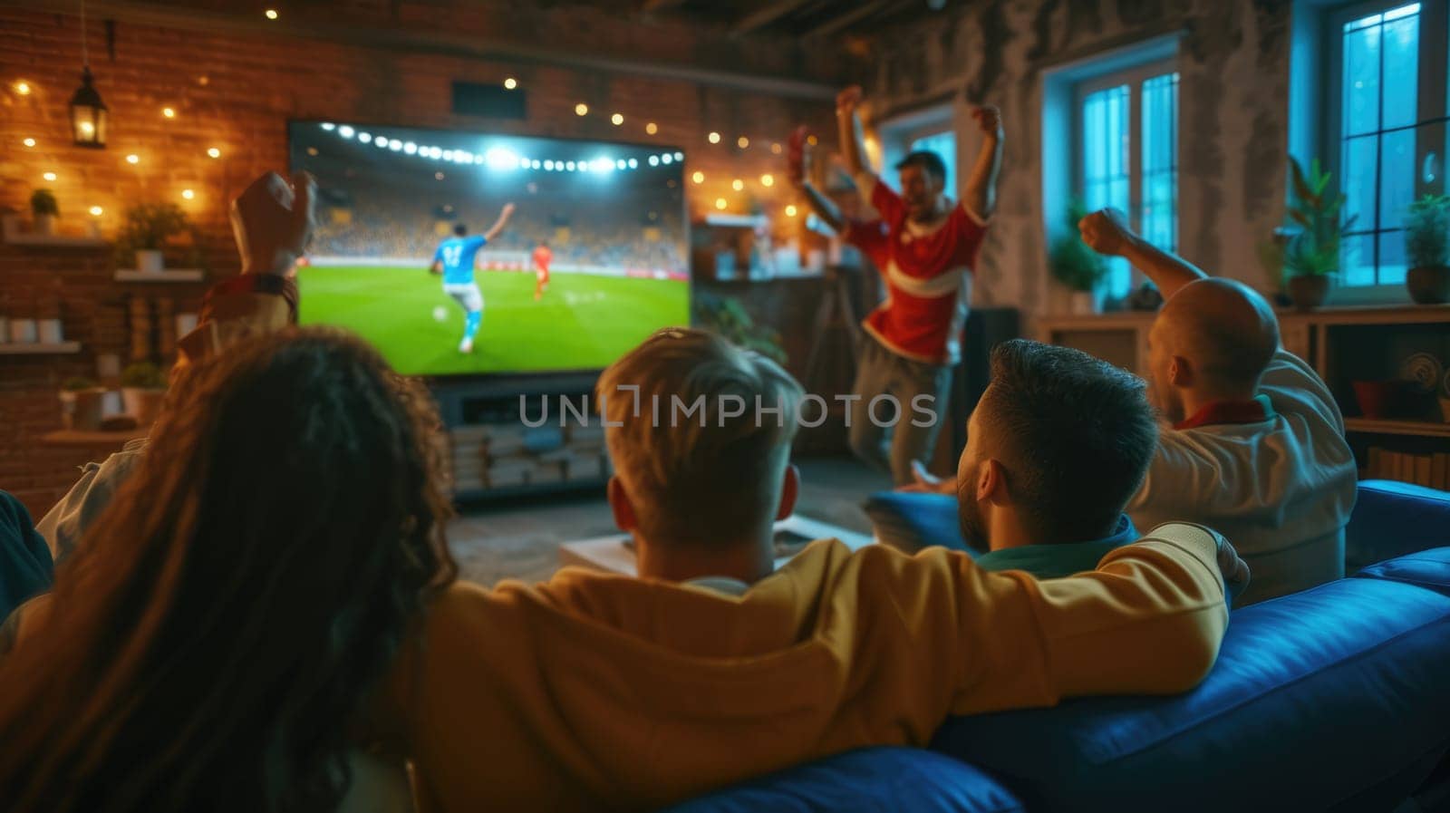 A group of people are sitting on a couch watching a soccer game on a television AIG41 by biancoblue