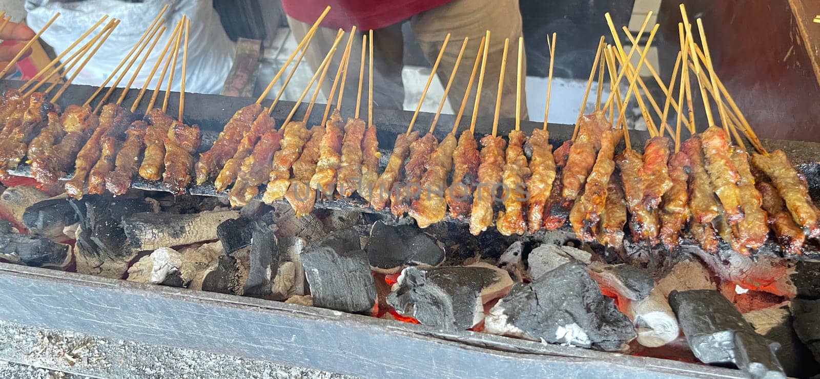 very flavorful beef satay meat grilled over charcoal, beef skewer delicious barbeque, sate sapi