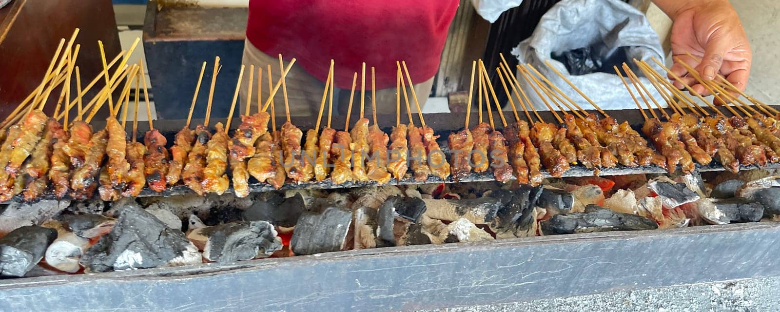 very flavorful beef satay meat grilled over charcoal, beef skewer delicious barbeque, sate sapi