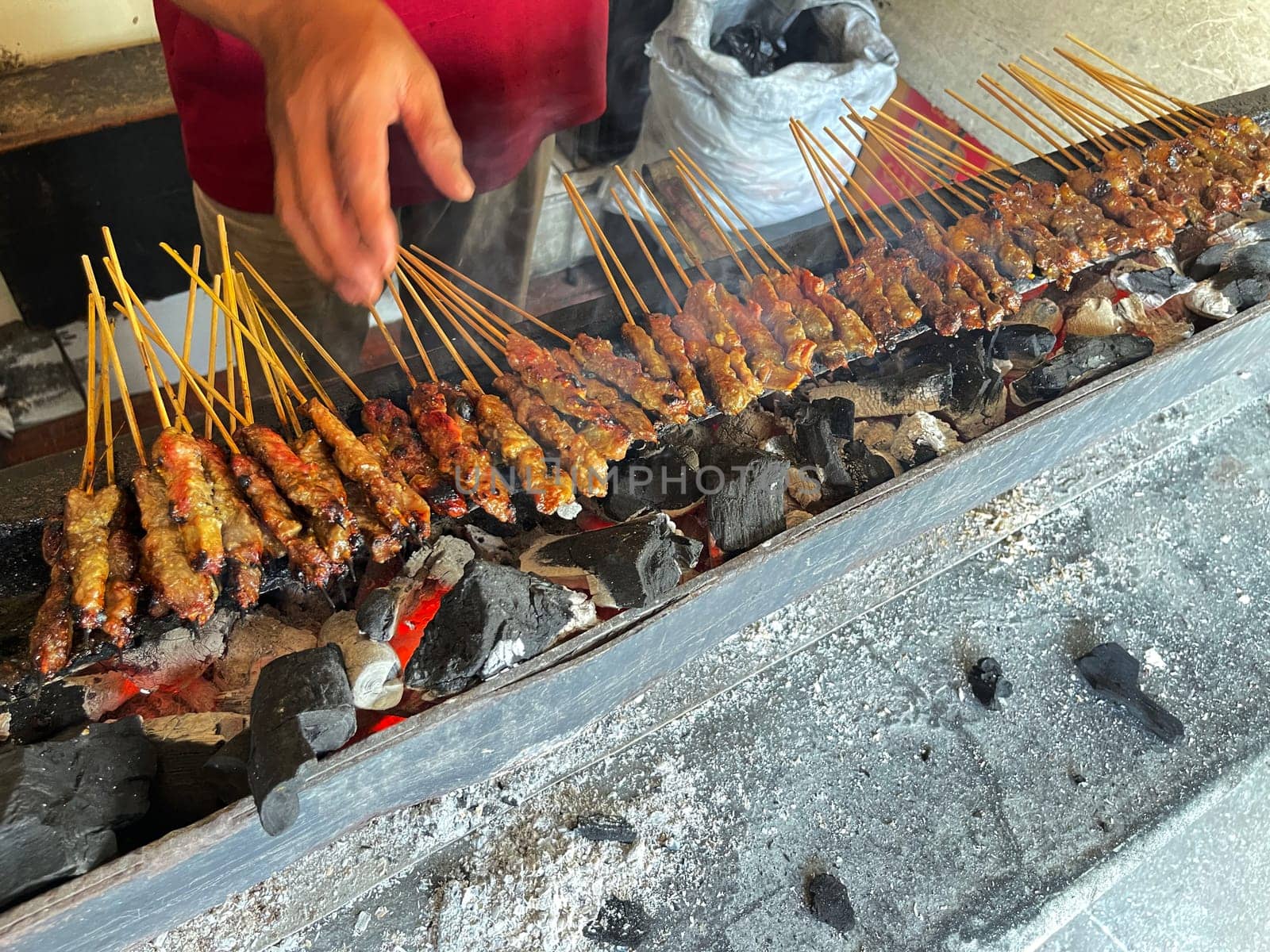 very flavorful beef satay meat grilled over charcoal, beef skewer delicious barbeque, sate sapi