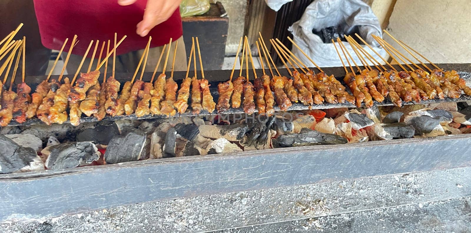 very flavorful beef satay meat grilled over charcoal, beef skewer delicious barbeque, sate sapi