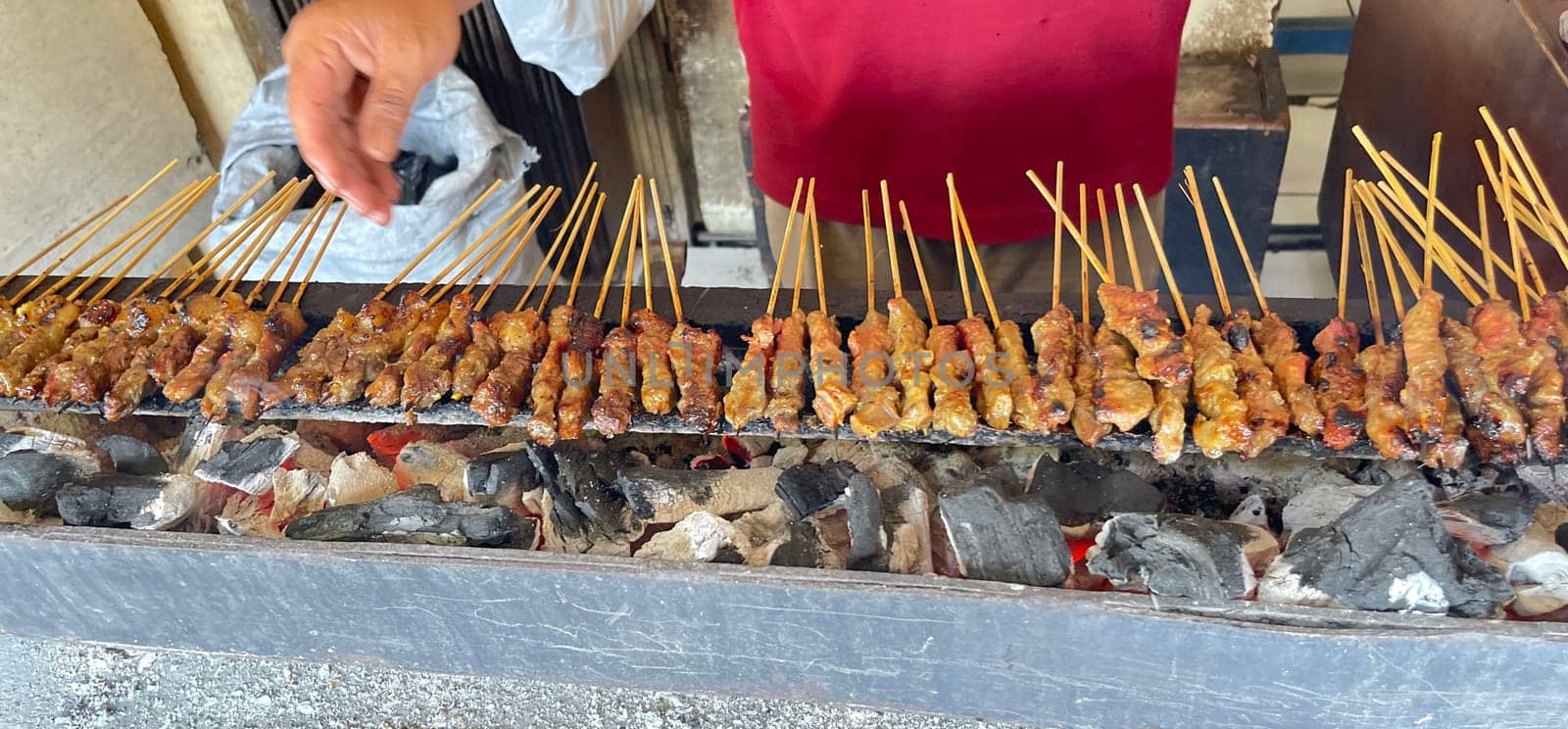 very flavorful beef satay meat grilled over charcoal, beef skewer delicious barbeque, sate sapi