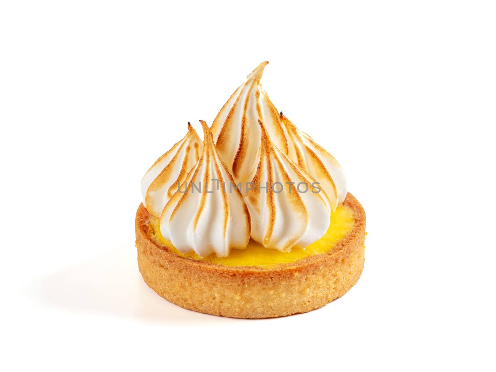 Mini cake decorated with whipped egg whites meringue. Mini lemon tart with burnt meringue isolated on transpaarent background,