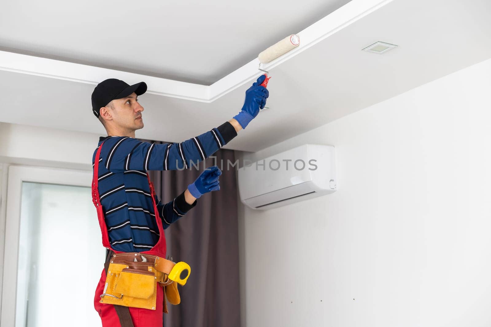 People renovating the house, working on repairs