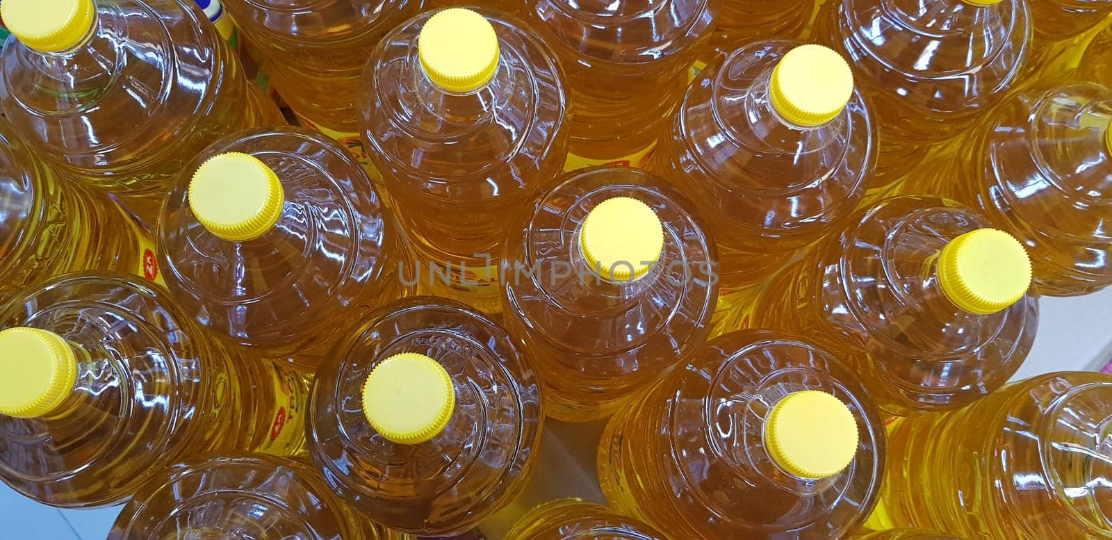 Close up top view of bottled cooking oil to be used for cooking selective focus.