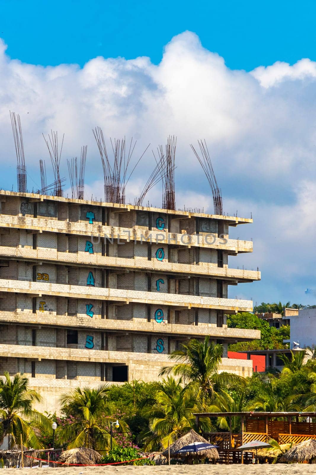 Huge gigantic construction stop building ruin in Puerto Escondido Mexico. by Arkadij