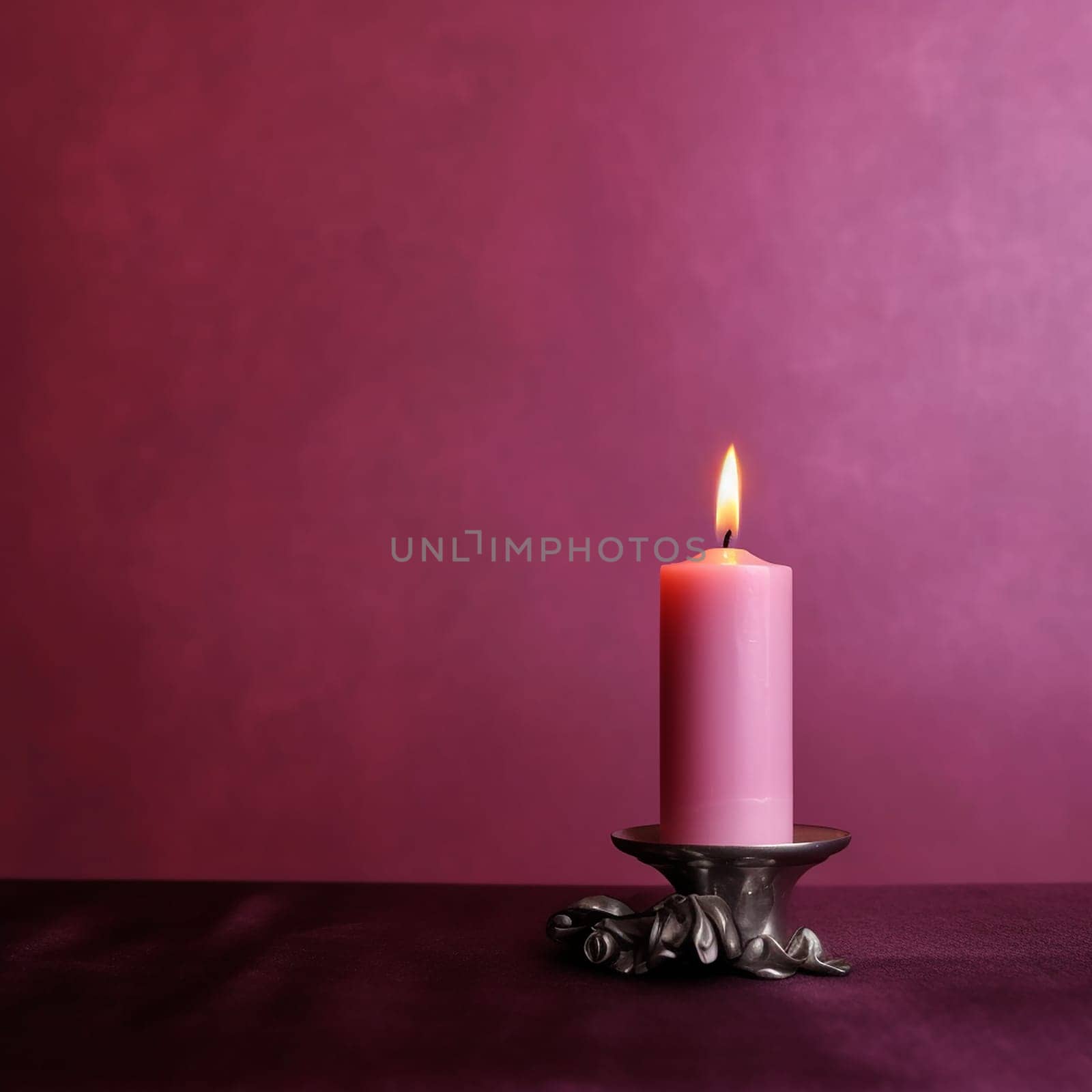 A single pink candle burning brightly on a vintage metal holder against a purple background.