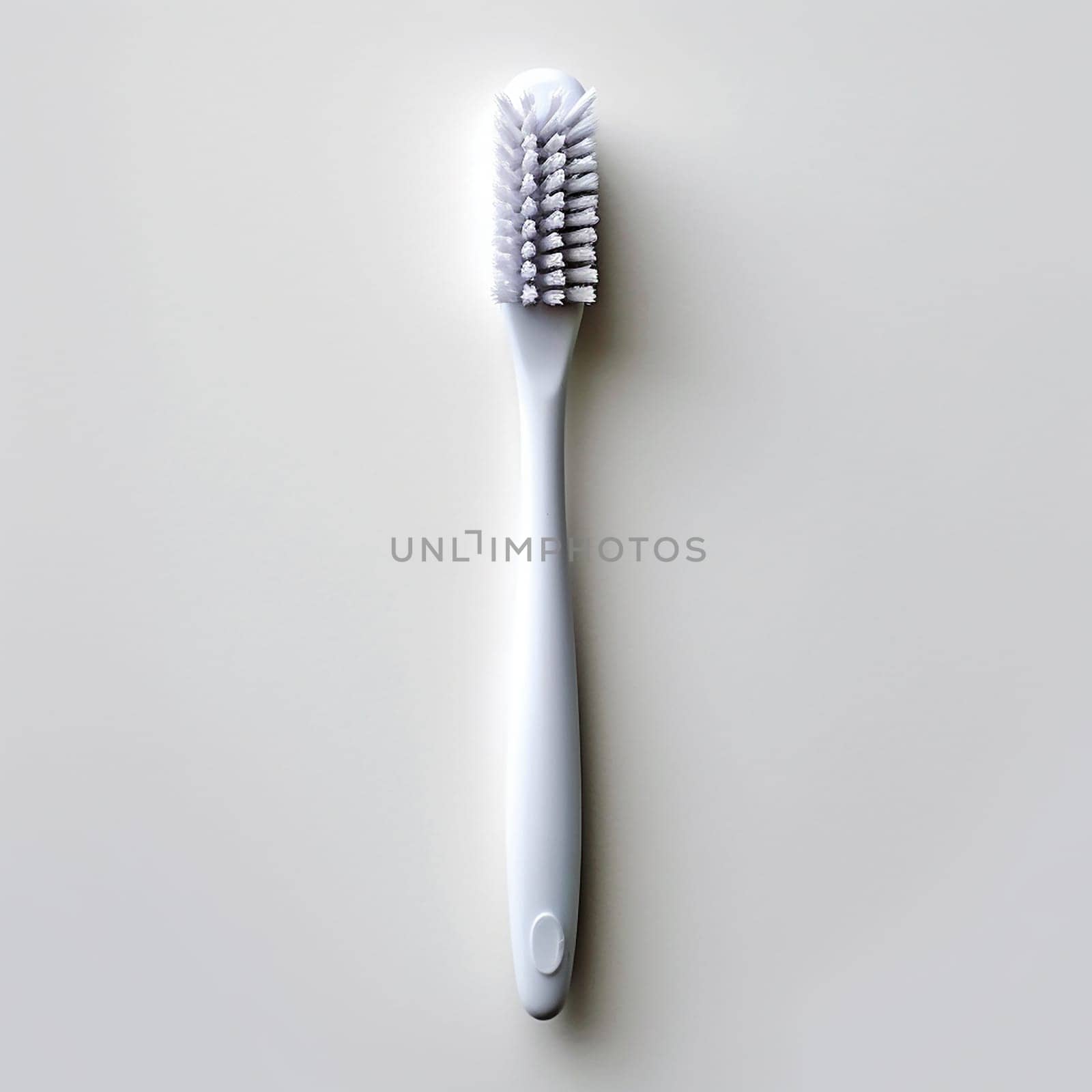 A single white toothbrush against a plain background. by Hype2art