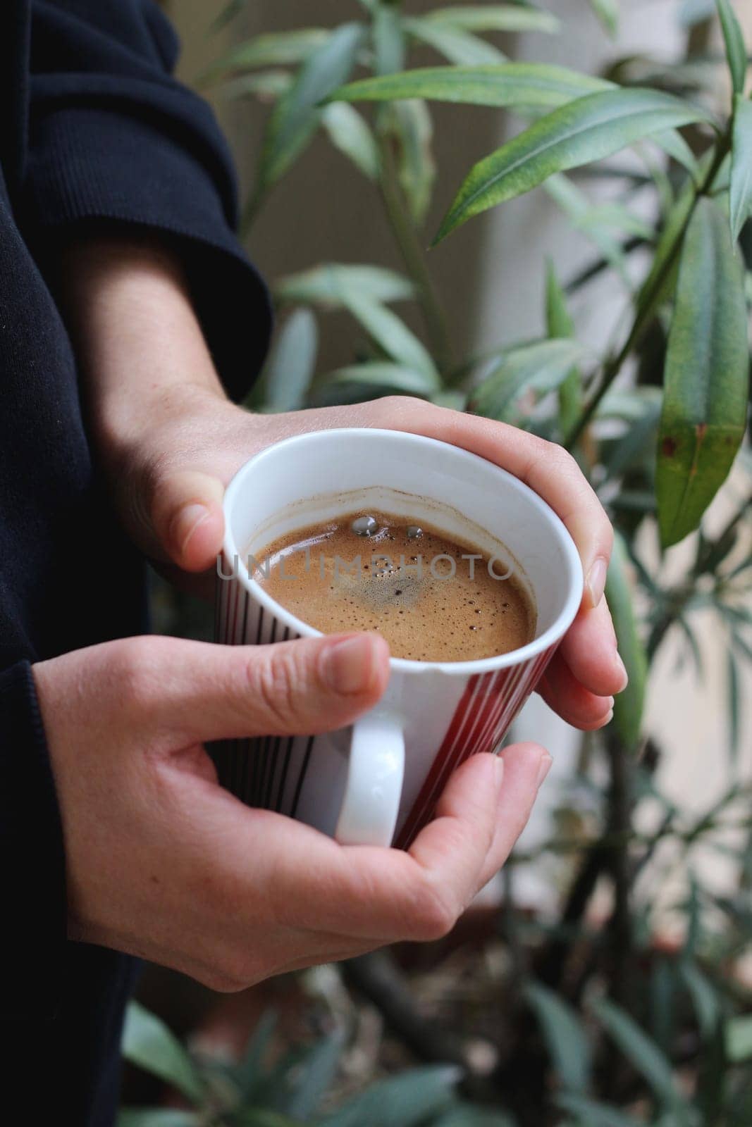 Step into a world of warmth and tradition as Greek coffee brews gently on a small gas burner, reminiscent of the beloved Turkish coffee ritual.