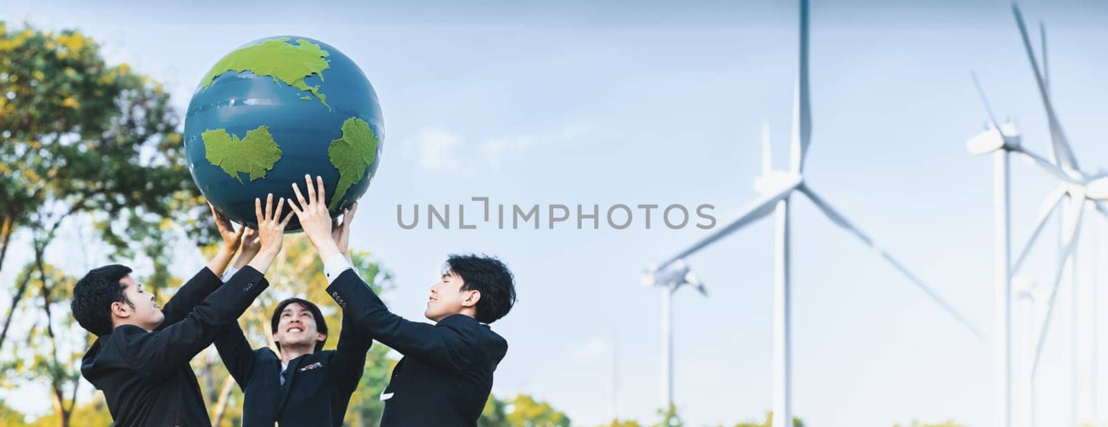 Earth day concept with big Earth globe held by hand up in sky. Gyre by biancoblue