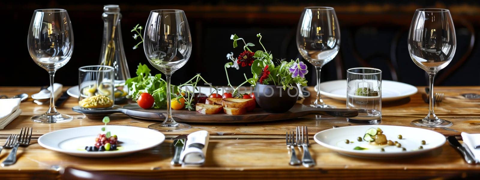 A wooden table adorned with tableware including plates, wine glasses, and utensils. The setting is perfect for a special event or intimate dining experience