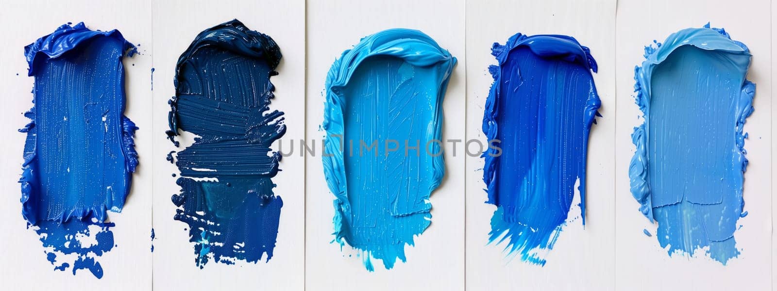 Various shades of blue paint cover a white surface by richwolf