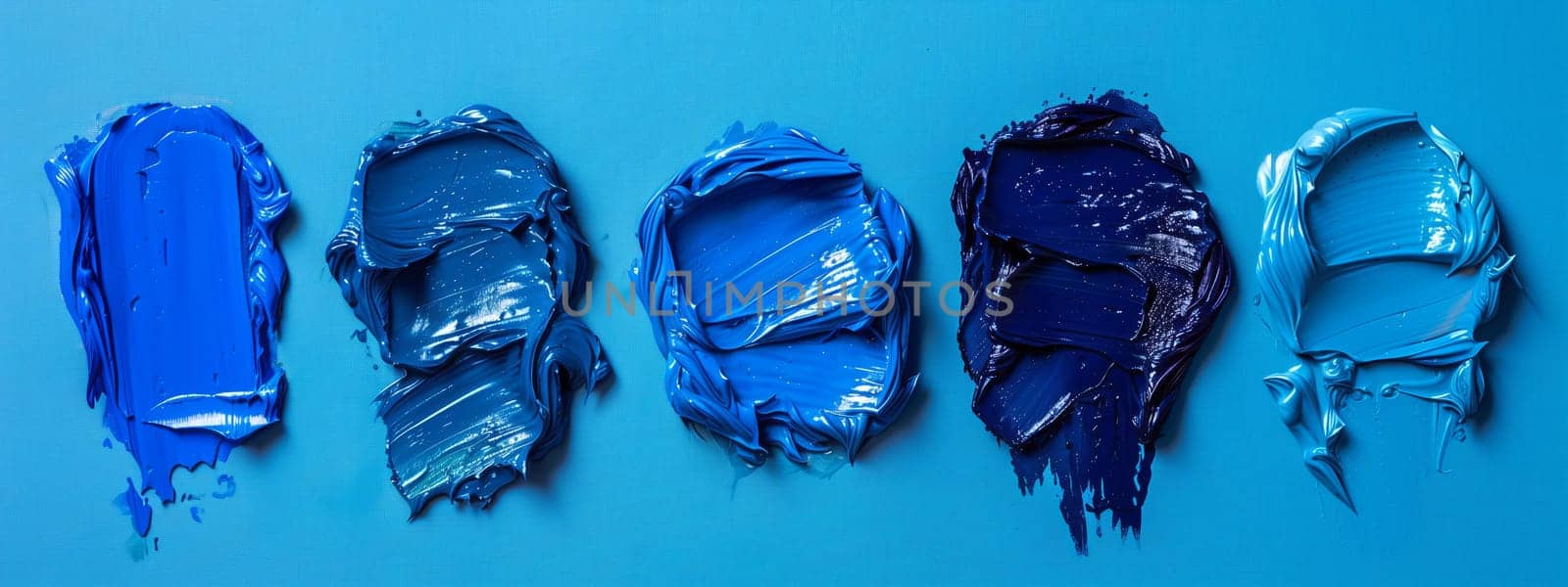 A row of various shades of azure, electric blue, and symmetrical paintings on a blue background. The perfect fashion accessory for any art event