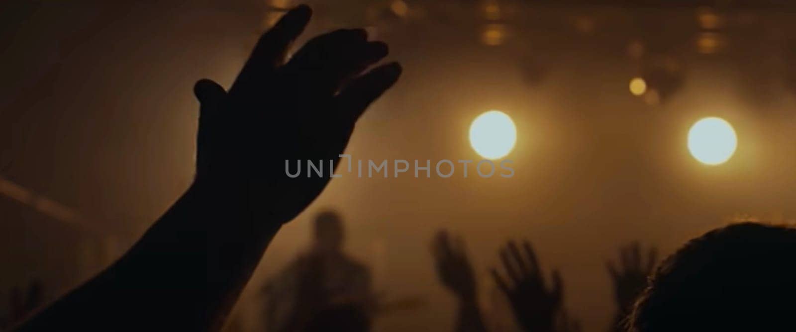 Blurry background picture of hand reaching out for God's help, good for your multimedia content background or card design