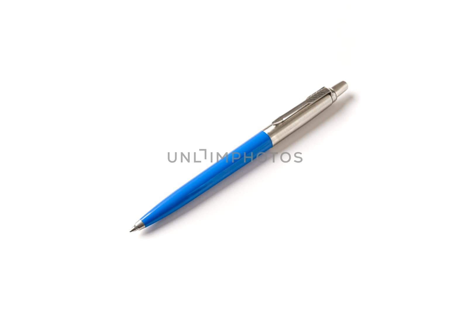 Blue plastic and metal ballpoint pen on white isolated background