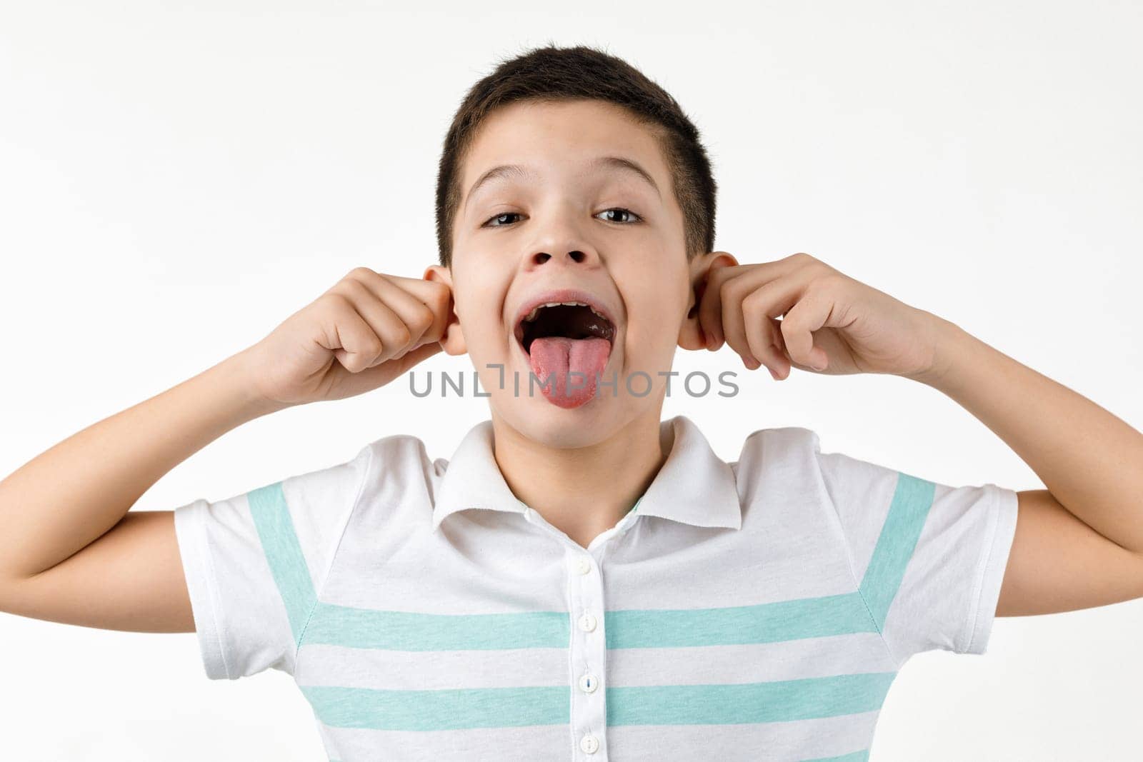 happy funny little child boy in striped t-shirt having fun by erstudio