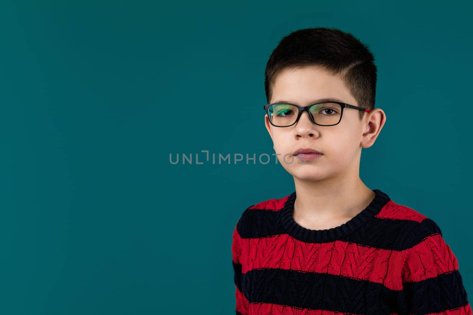 little cheerful school boy wearing glasses by erstudio