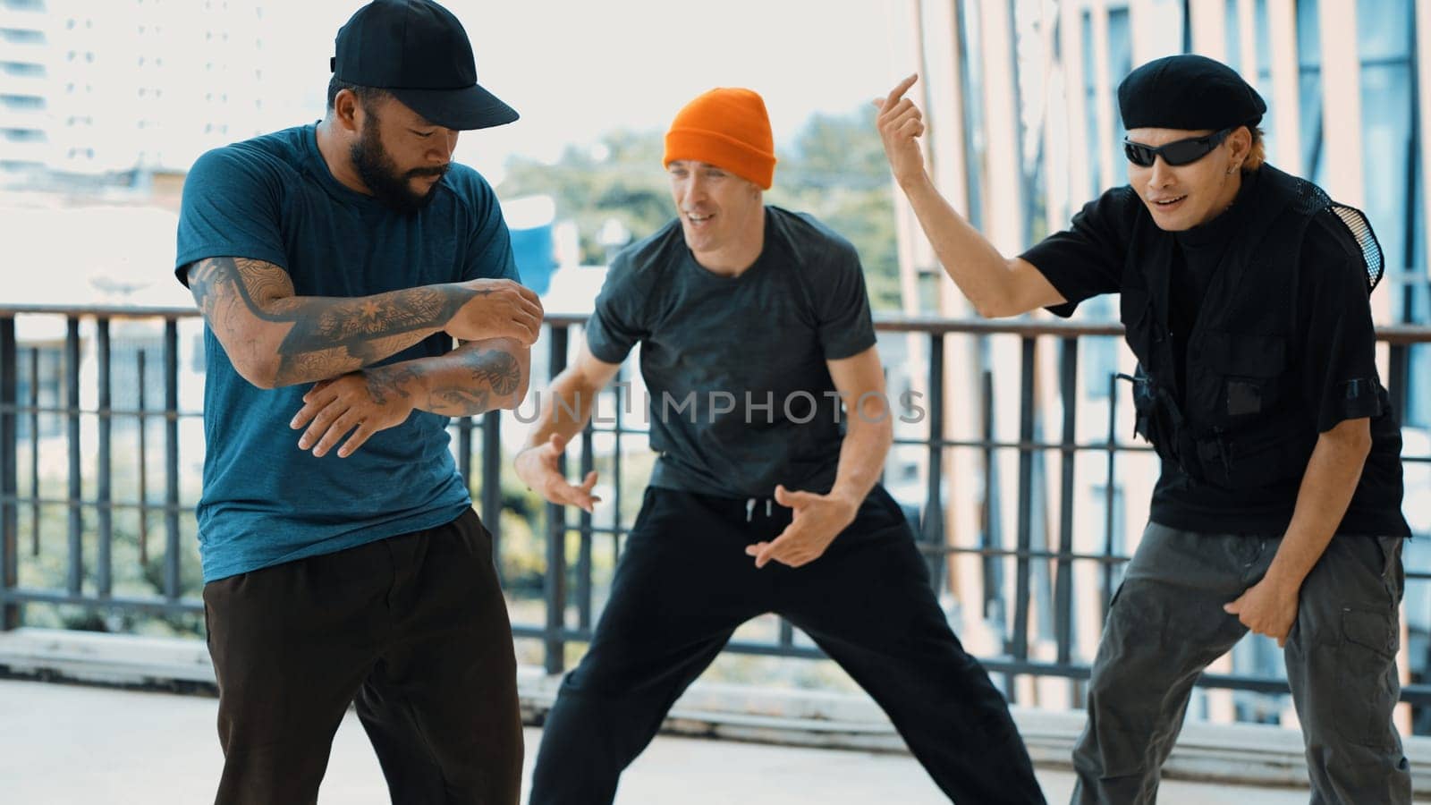 Hipster perform break dancing while partner dancing together at corridor, modern mall. Hip-hop music dancer practice footstep and move to music. Outdoor sport 2024. Active, energetic dance. Endeavor.