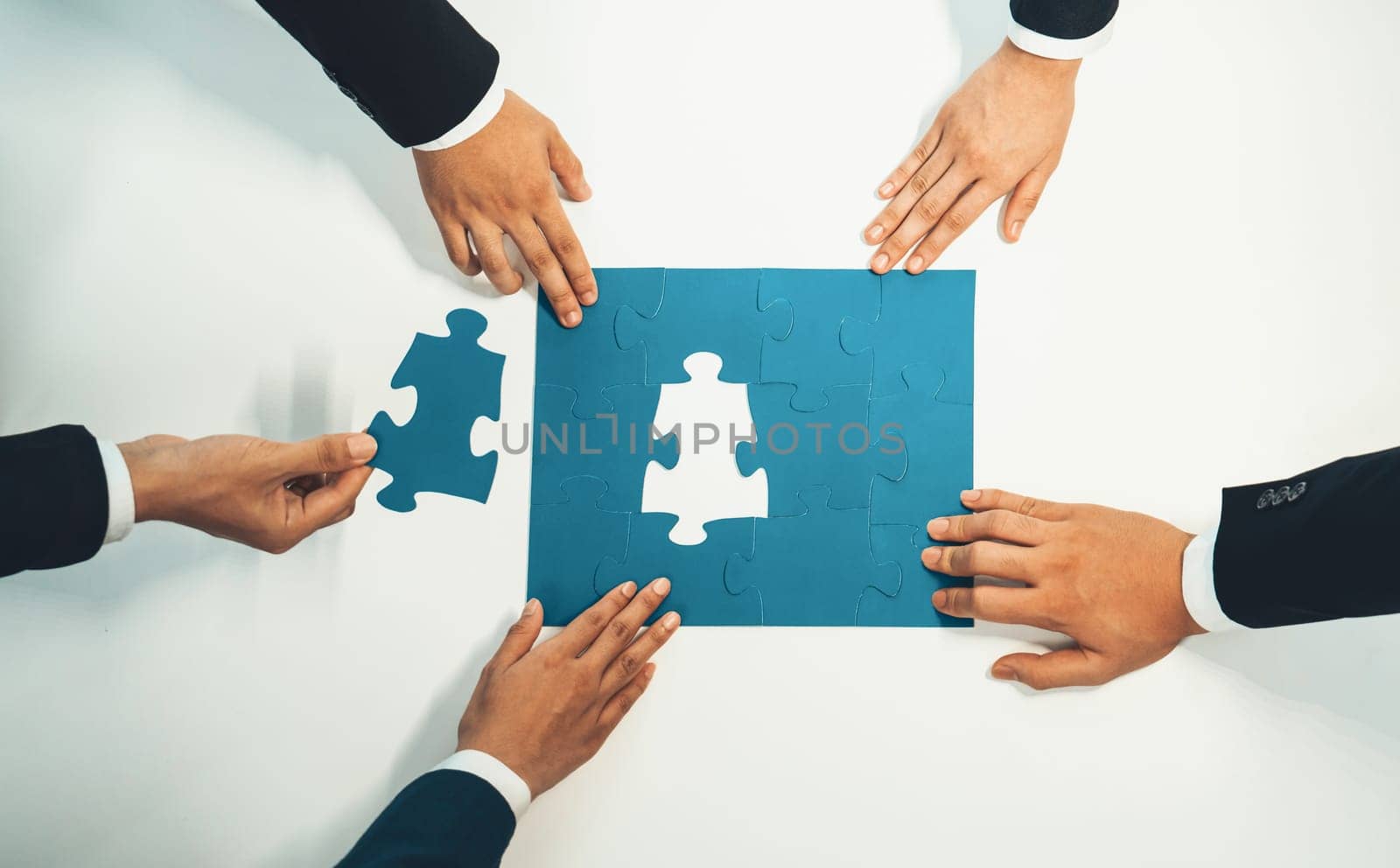 Top view panorama banner of business team assembling jigsaw puzzle over table symbolize business partnership and collective teamwork for HR recruitment and job seeker background. Shrewd