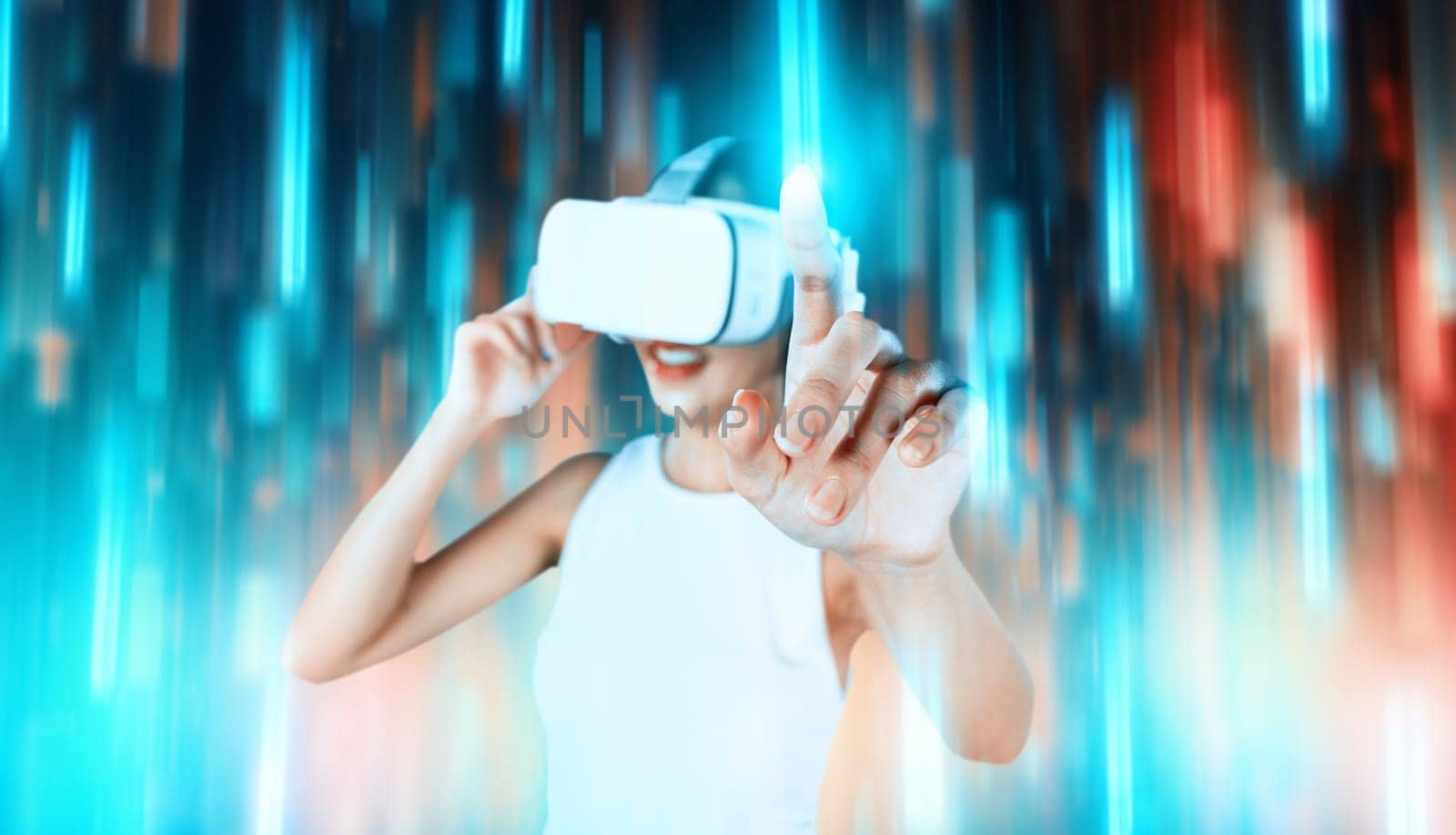 Female stand wear white VR headset and sleeveless connecting metaverse, future technology, surrounded by abstract light. She use index finger touch hologram object of virtual reality. Hallucination.